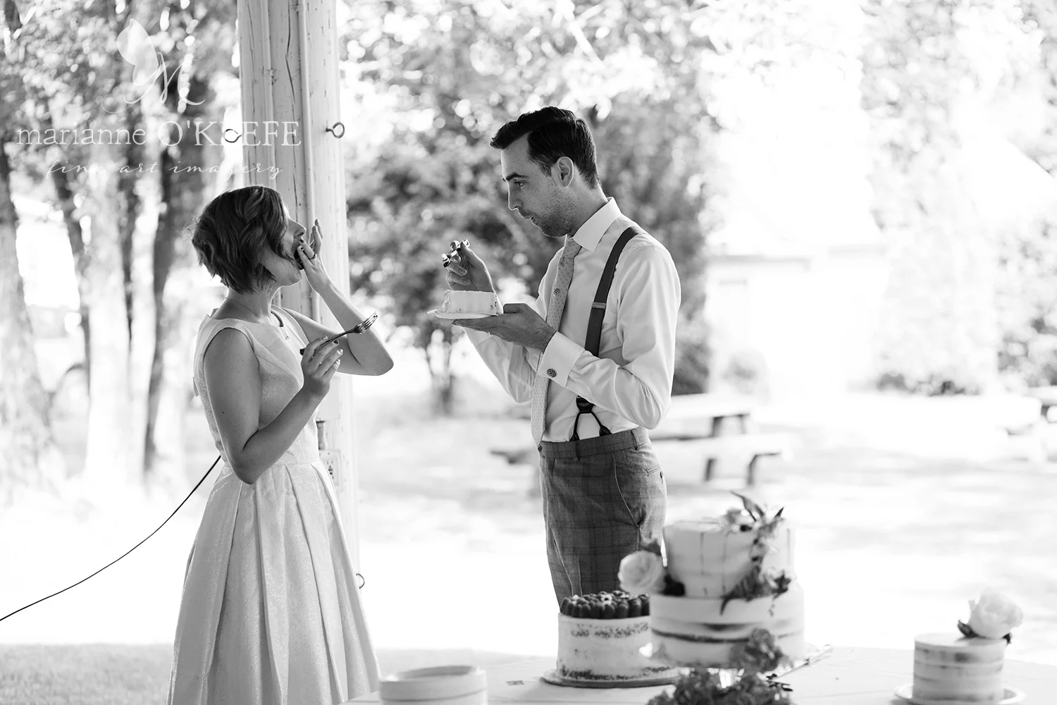 D&WReception72_cakecutting_b&w_web.jpg