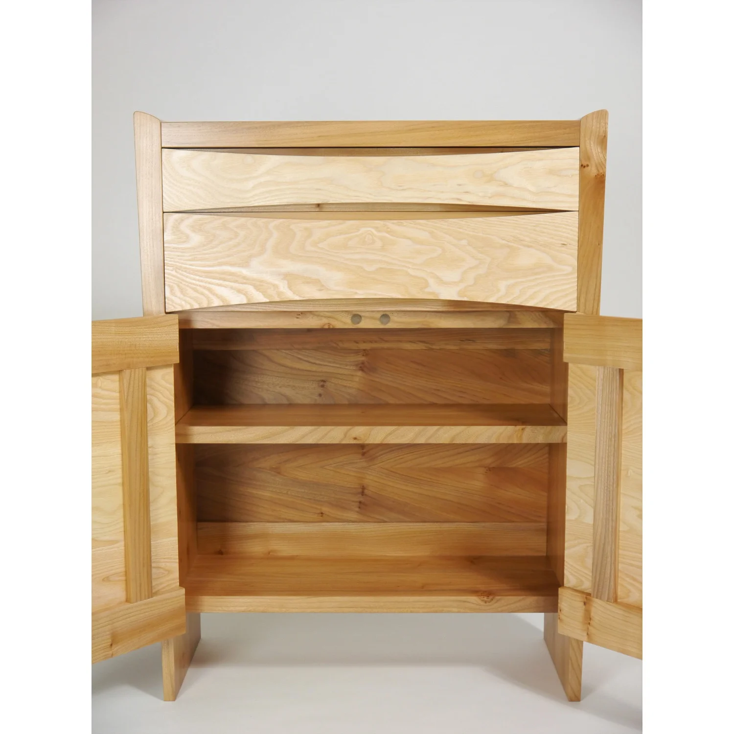 Doors open on Tapered Cabinet in Elm and Ash by Alasdair Wallace