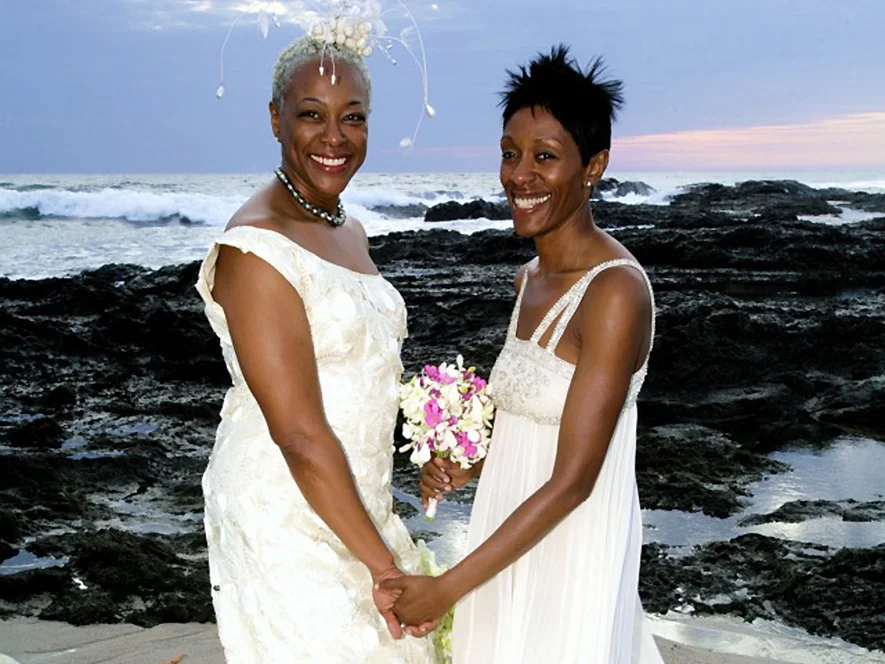Before family and friends, at Cala Luna in Costa Rica, the blithe spirit wed the lithe athlete.
