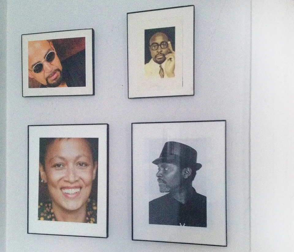 One wall, hung with framed photographs of friends, Jerry Gonzalez, Todd Johnson, Marpessa Dawn Outlaw and Sekou Sundiata provides ancestral creative inspiration. 
