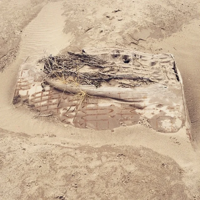 The dried river bed is near by residential homes and jogging sites. Trash is a usual in the river bed, but it was fun to see a bed in the river bed. Mattresses remind us of comfort and home. This bed is becoming apart of the landscape and earth. 