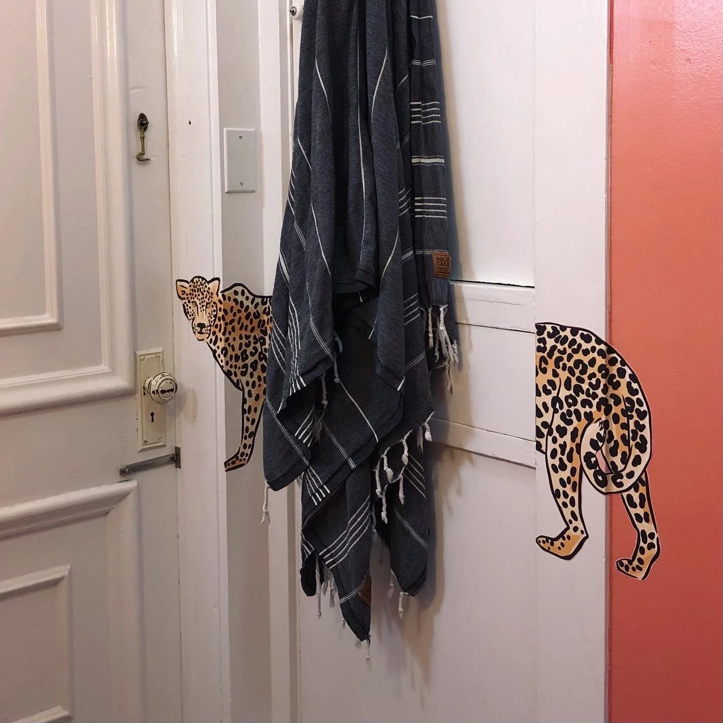 turkish towel in a cheetah bathroom.jpeg