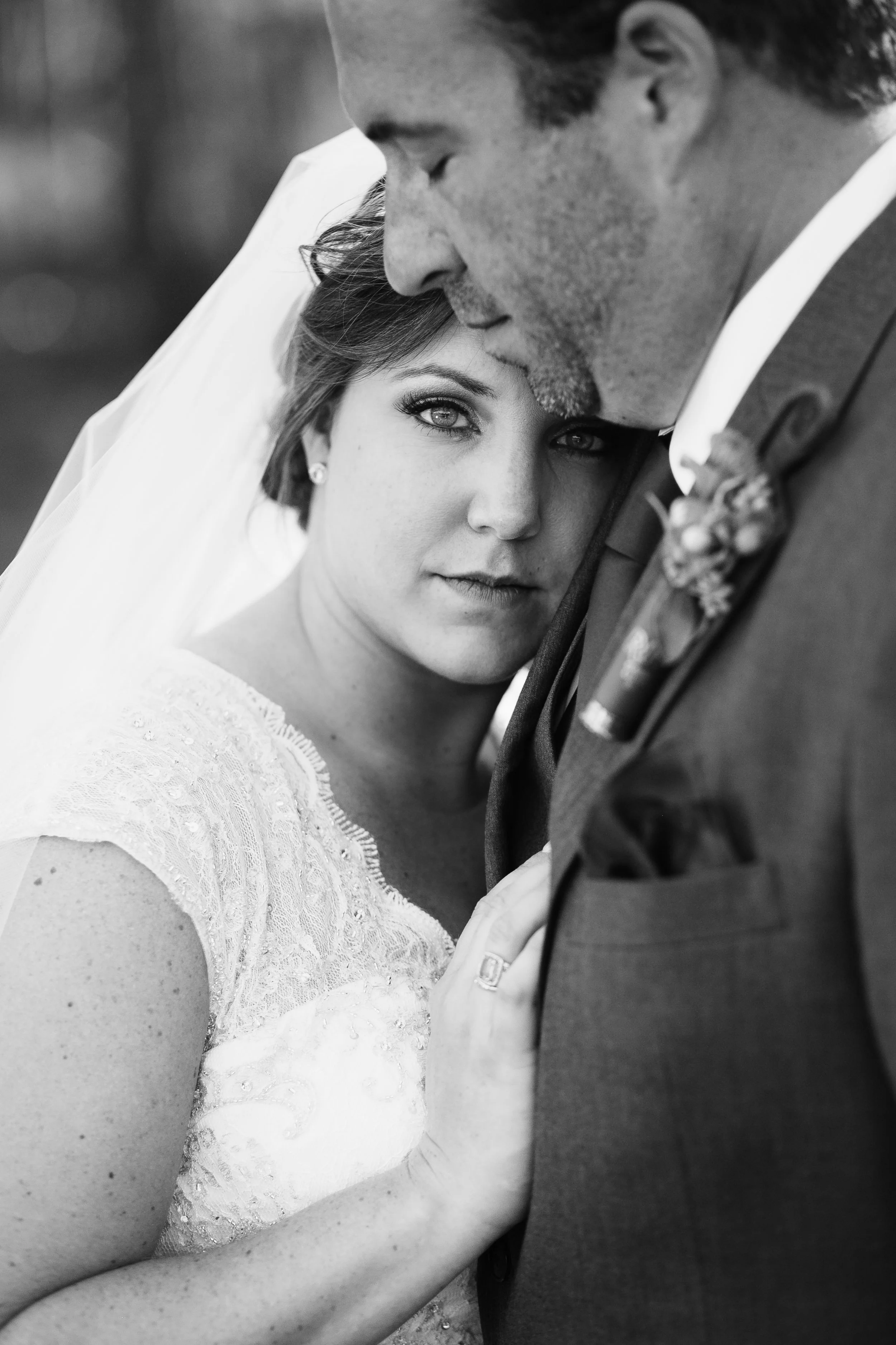Loving Embrace Bride and Groom - Wedding Photographer