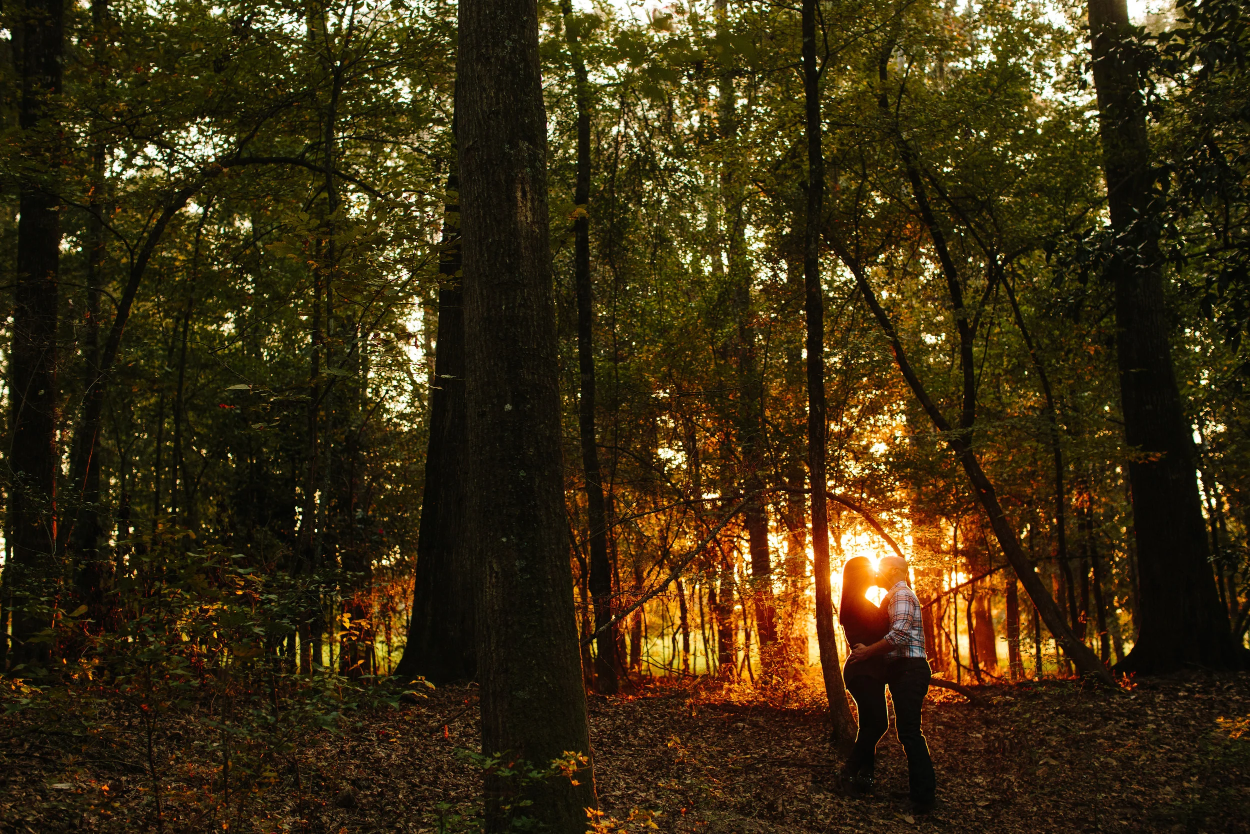Engagement Kiss at Sunrise in The Woods - Macon Georgia