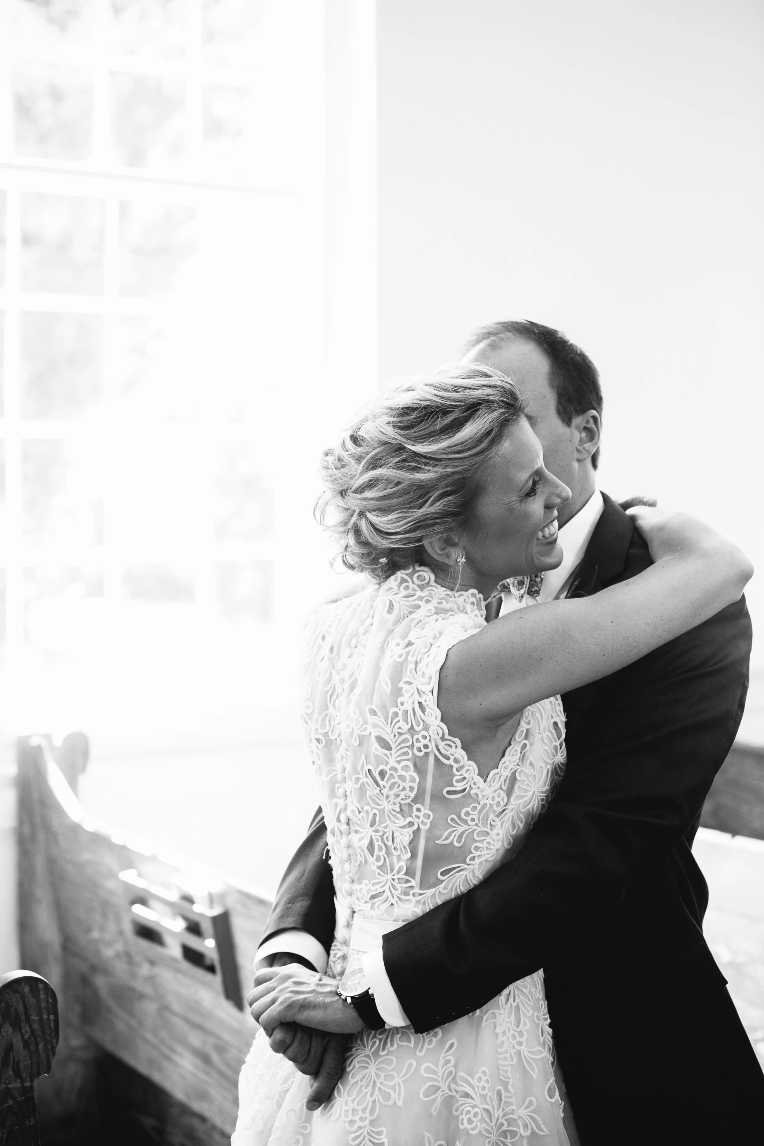 Bride & Groom Hugging - Wedding Photographer