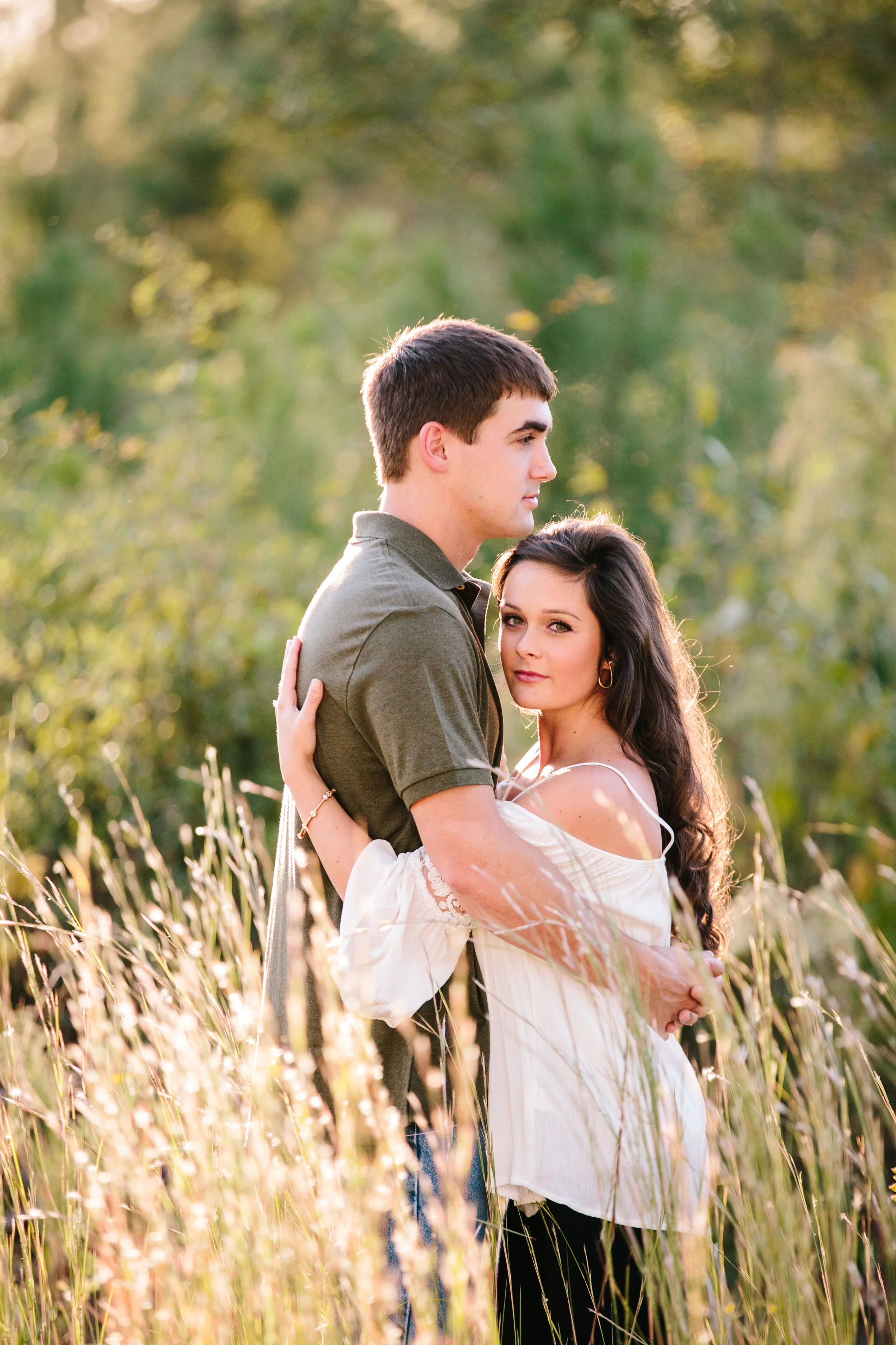 Beautiful Engaged Couple Hug in Field of Tall Grass - Engagement Photographer Macon, Ga