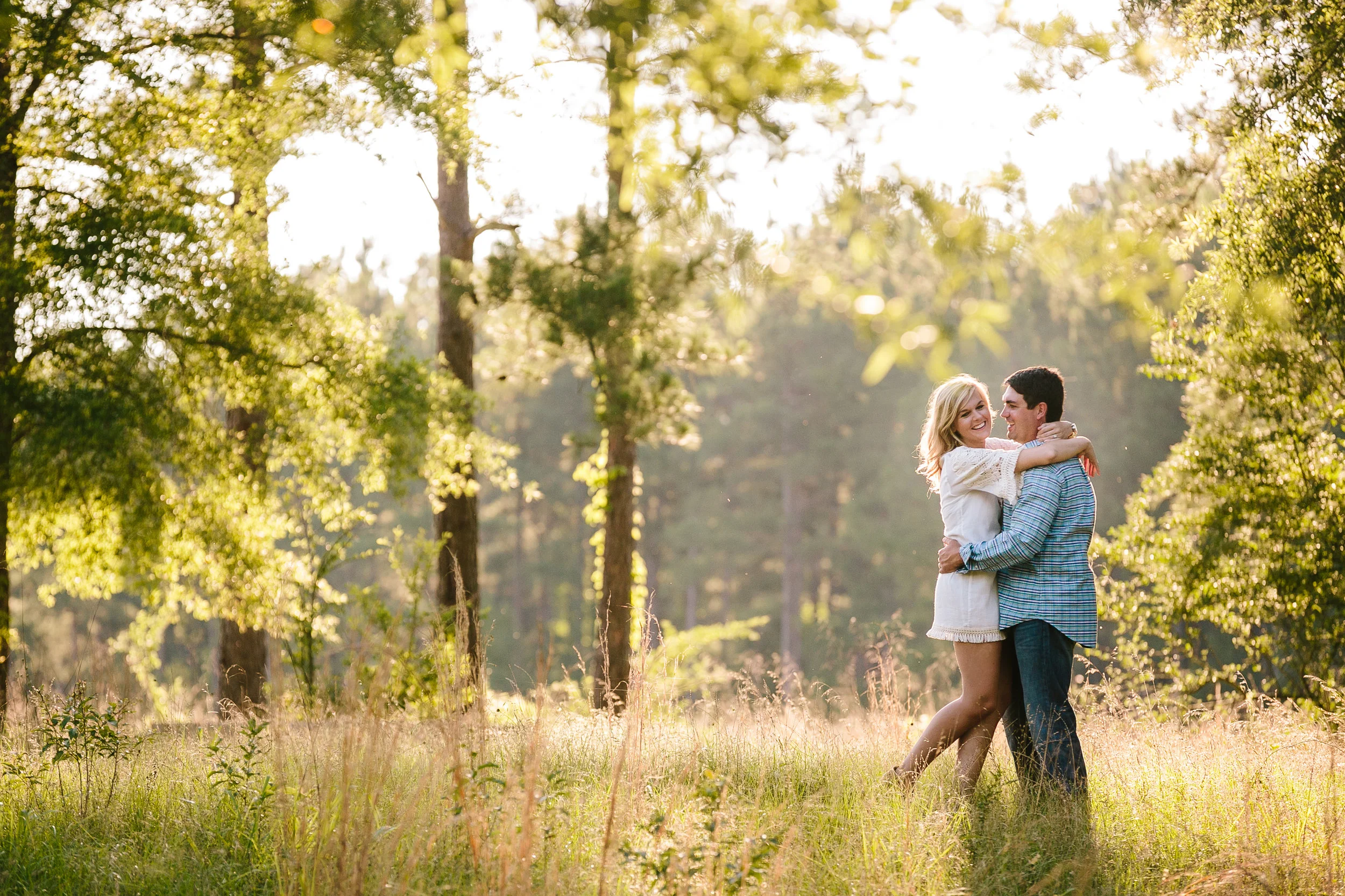 Young Couple In the Woods - Engagement Portrait