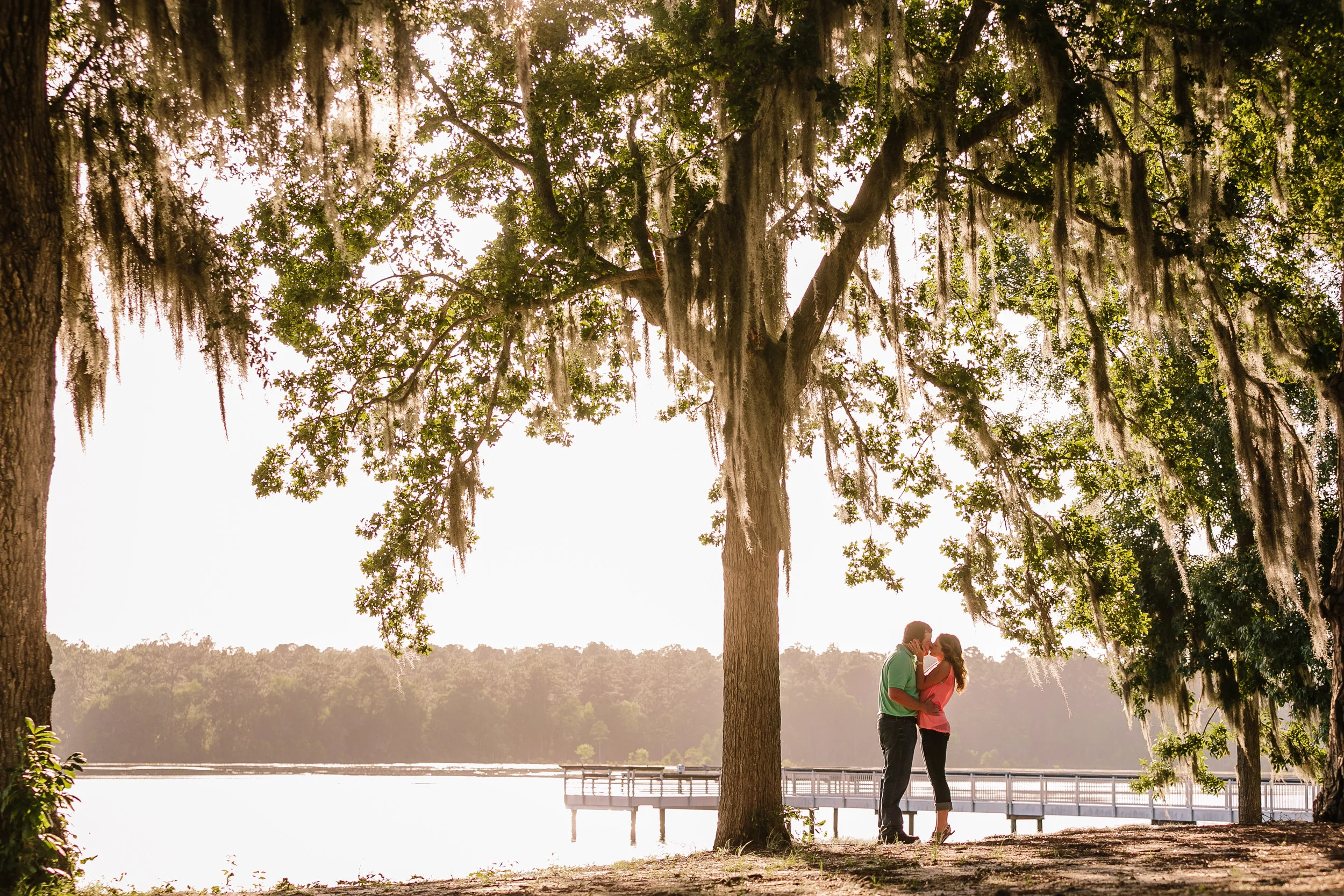 A Kiss Under The Oaks - Lakeside Engagement Portraits