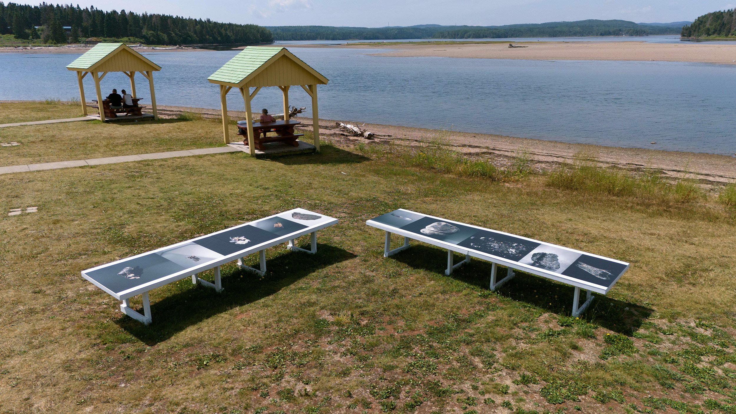 An image showing a photographic installation by Andreas Rutkauskas in Chandler, Québec. Part of Les Rencontres de la photographie en Gaspesie, 2024