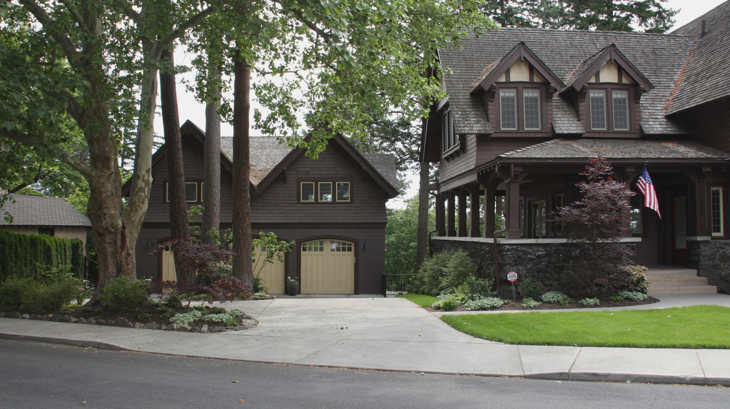 detached craftsman garage landscape