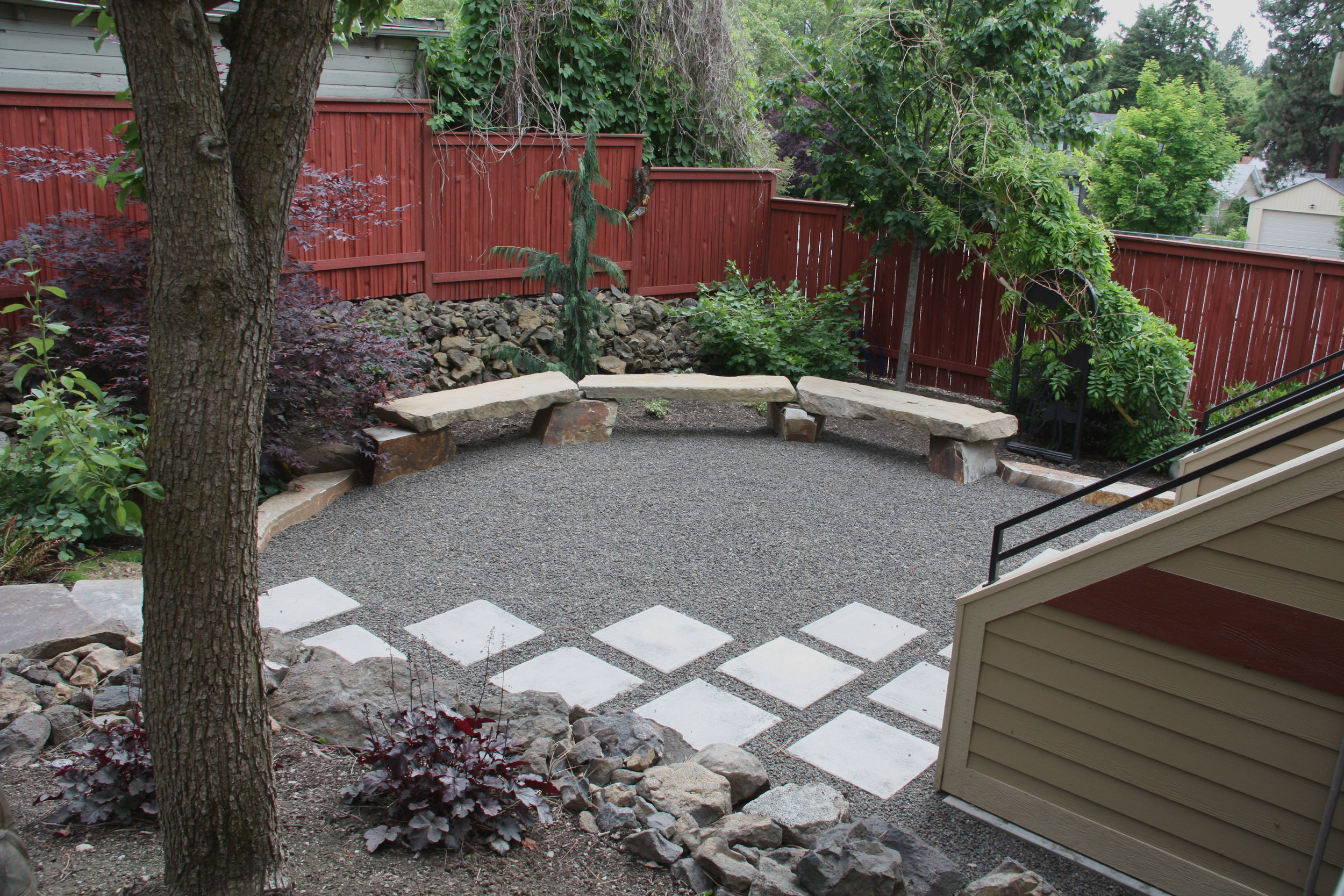 stone benches and gravel patio