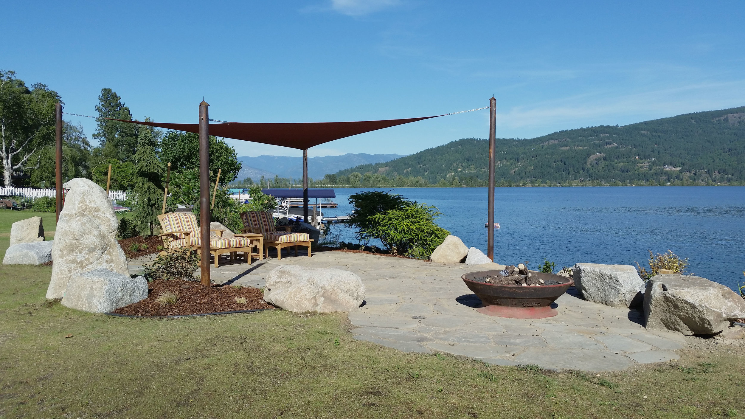 lakeside patio with shade sail