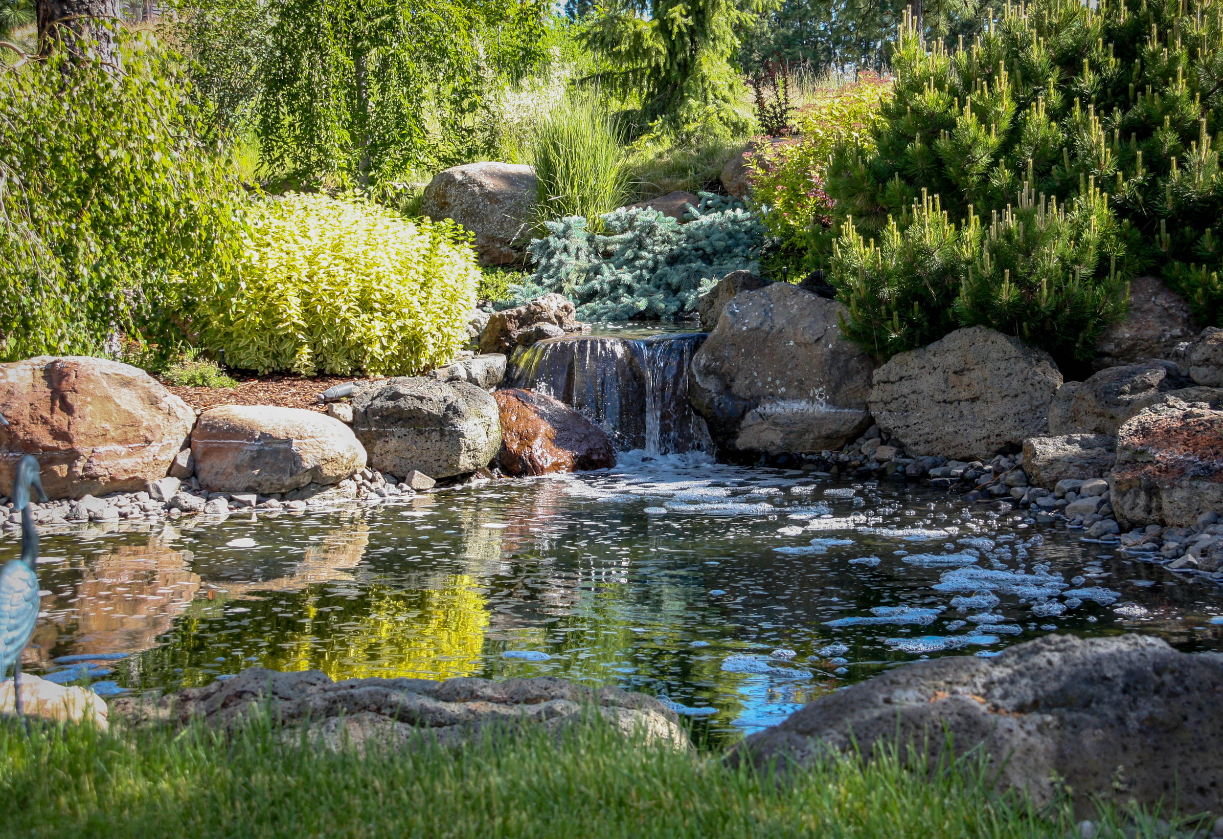 natural pond water feature with waterfall spokane