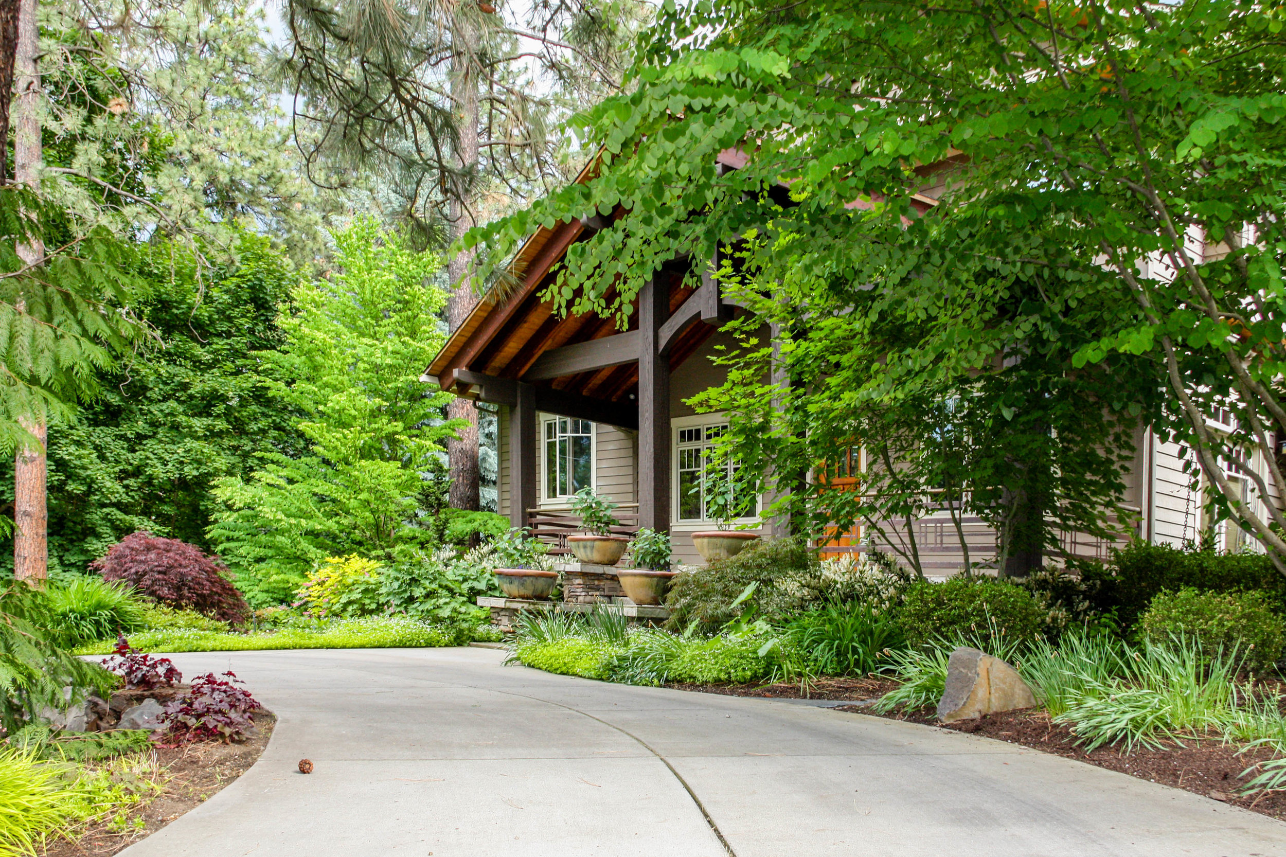 spokane craftsman porch and landscaping with circle driveway