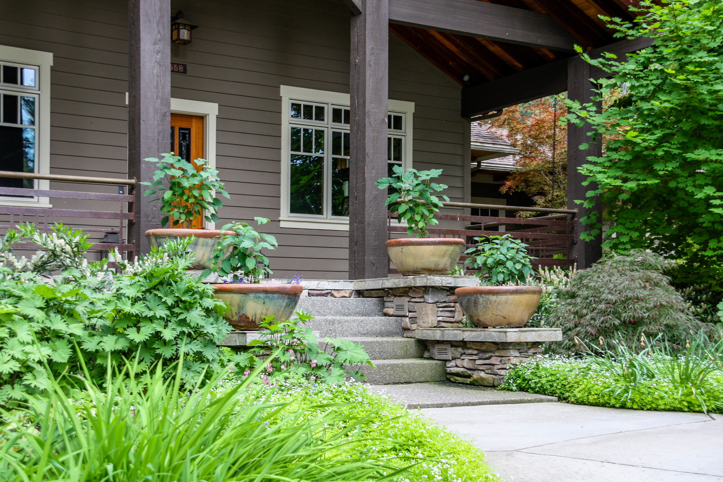 spokane craftsman front porch with container plantings