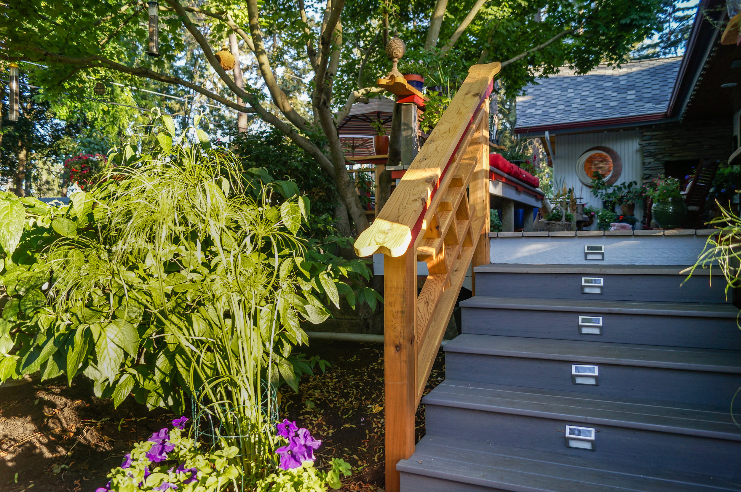 pvc deck stairs with asian inspired details for mid century ranch house on spokane south hill