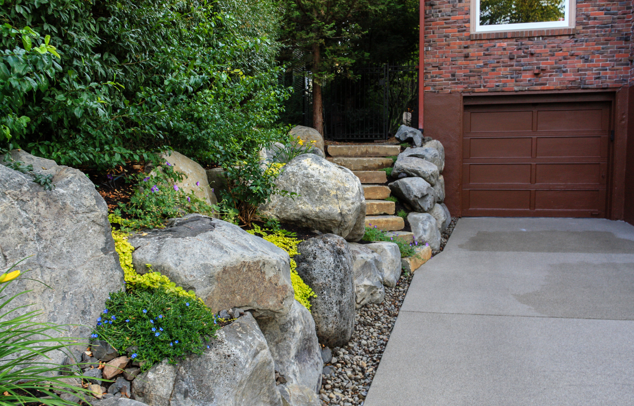 natural stone steps and boulder retaining walls 