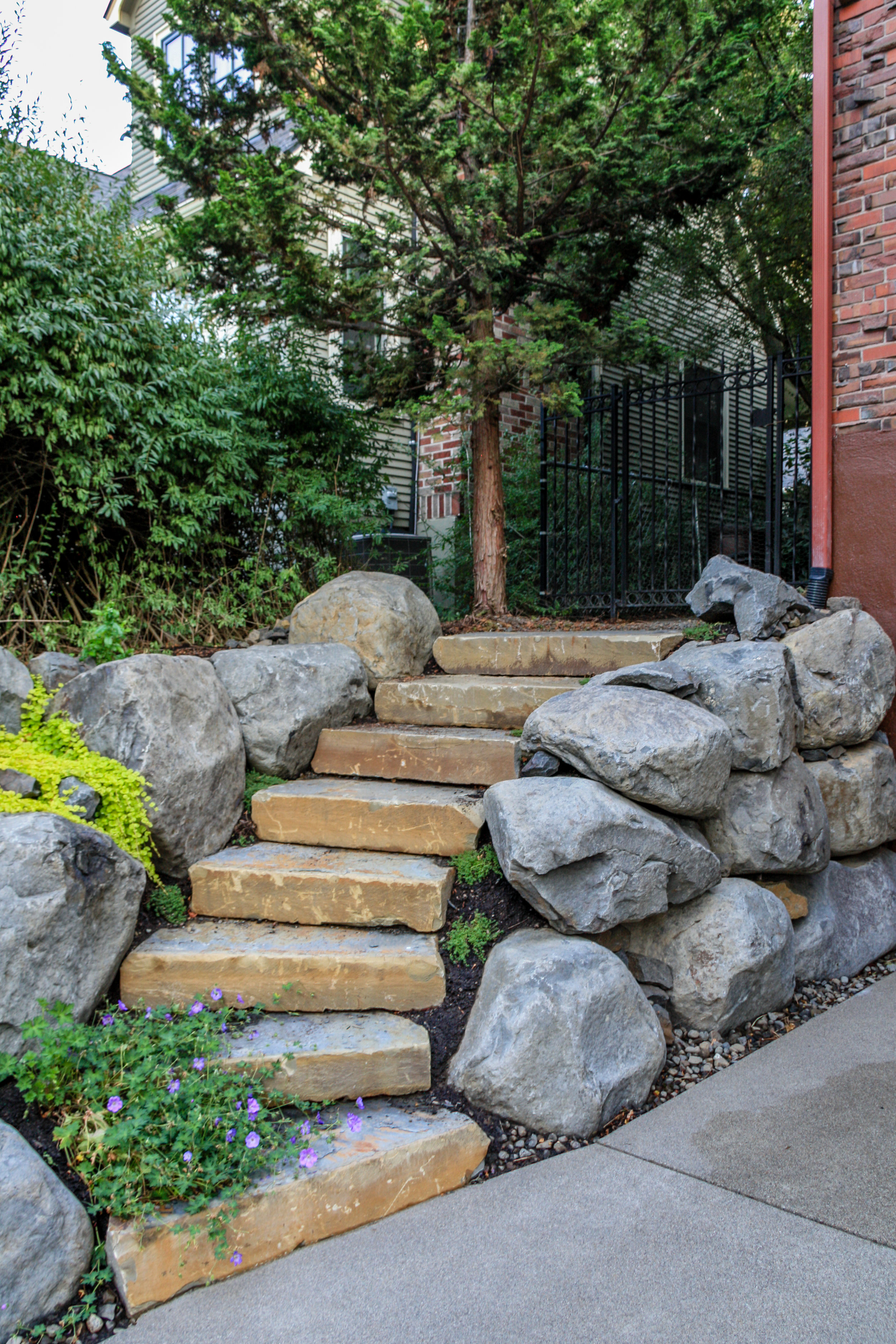 natural stone steps and boulder retaining walls in spokane