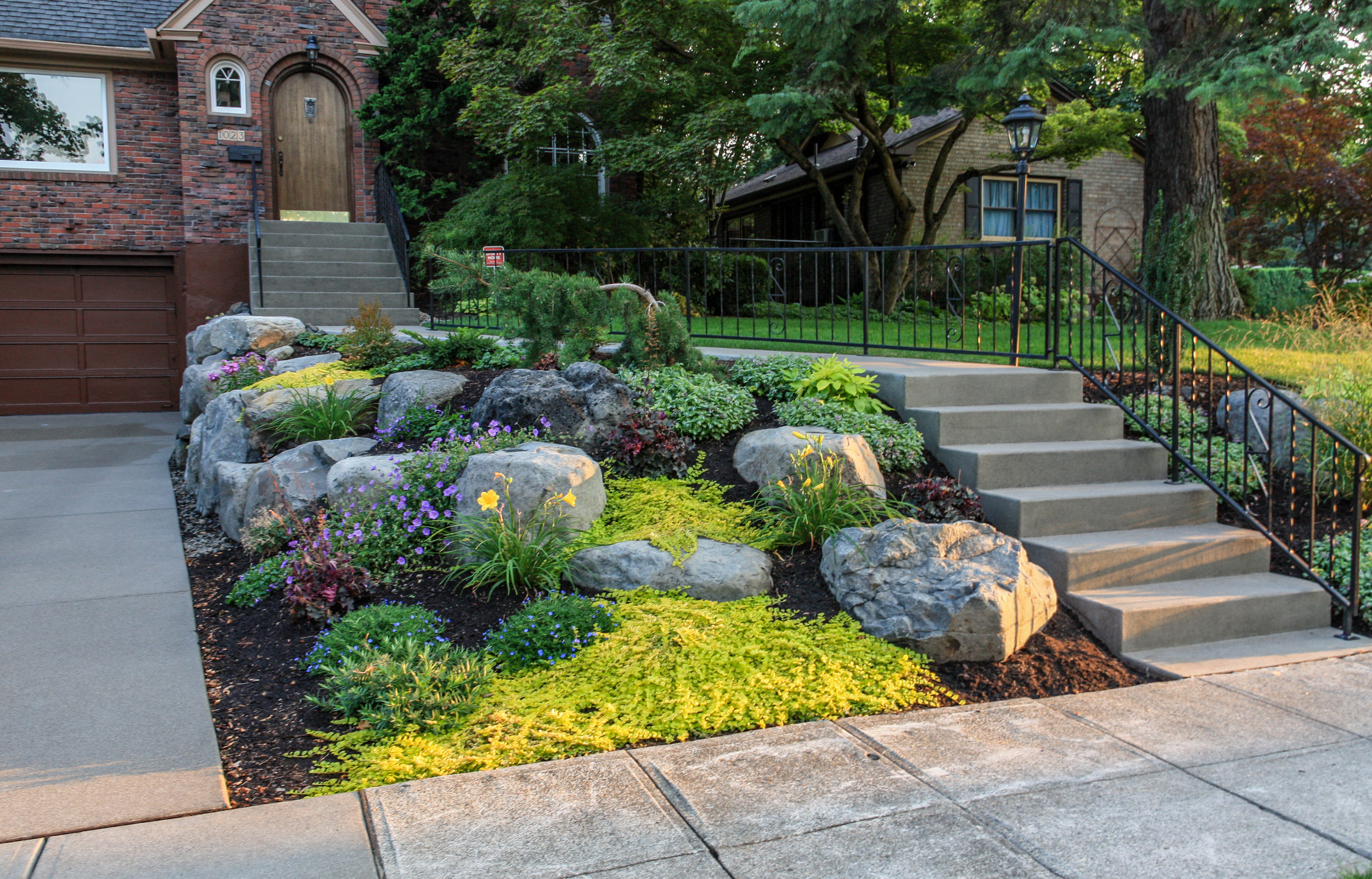 spokane south hill landscaping with rock outcroppings