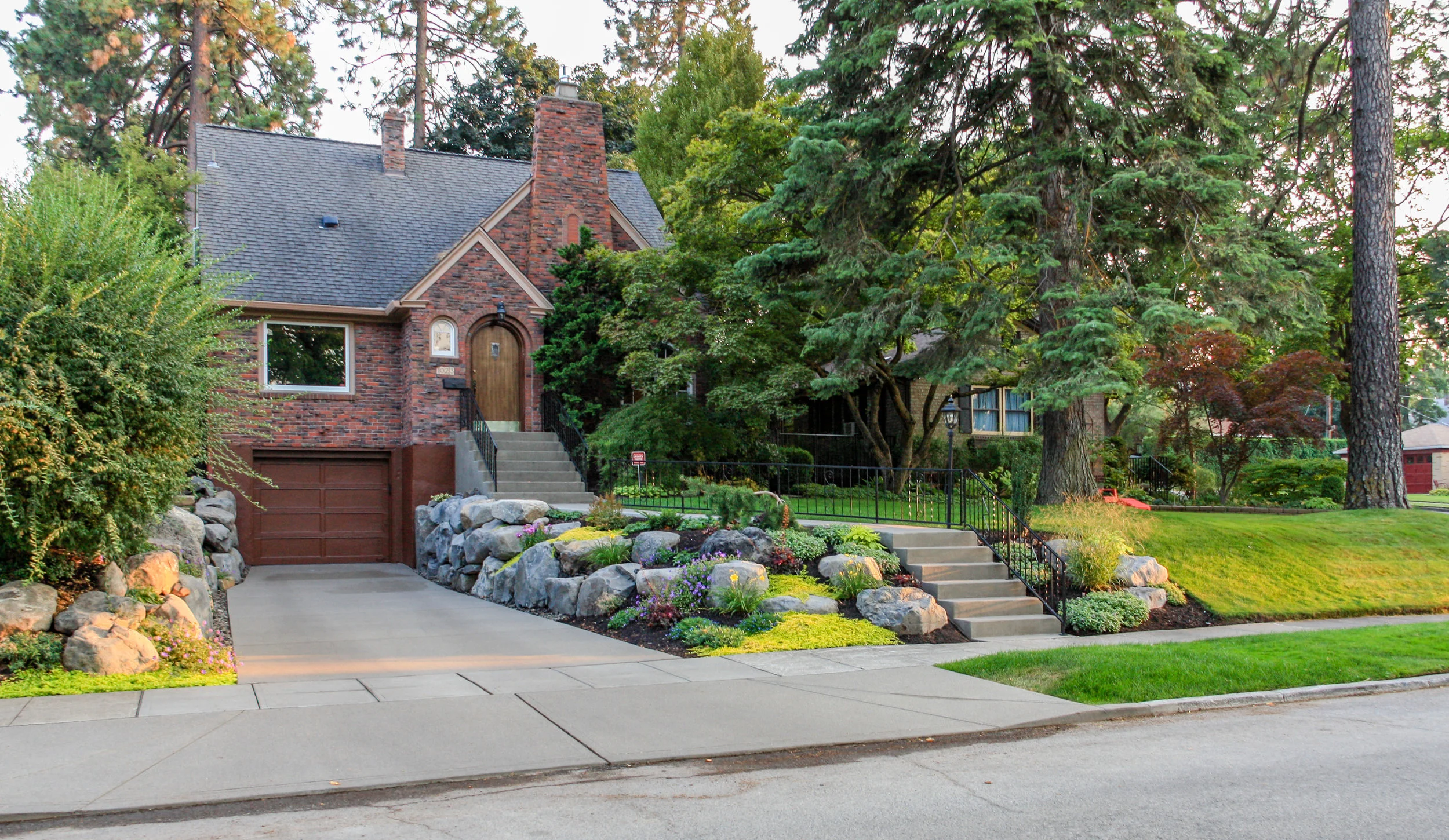 south hill tudor bungalow with new retaining walls and driveway