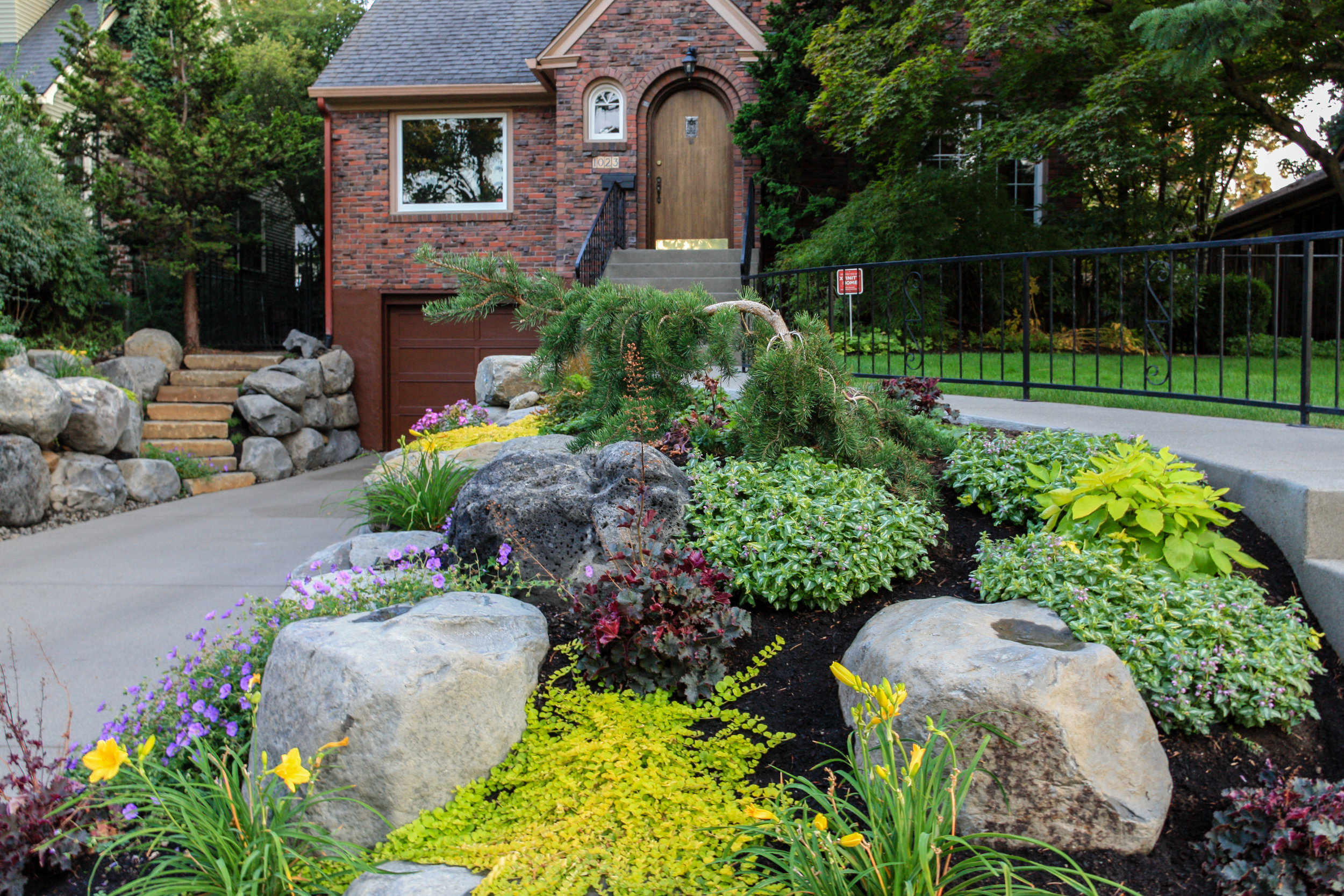 spokane south hill landscape with boulder walls and rock garden