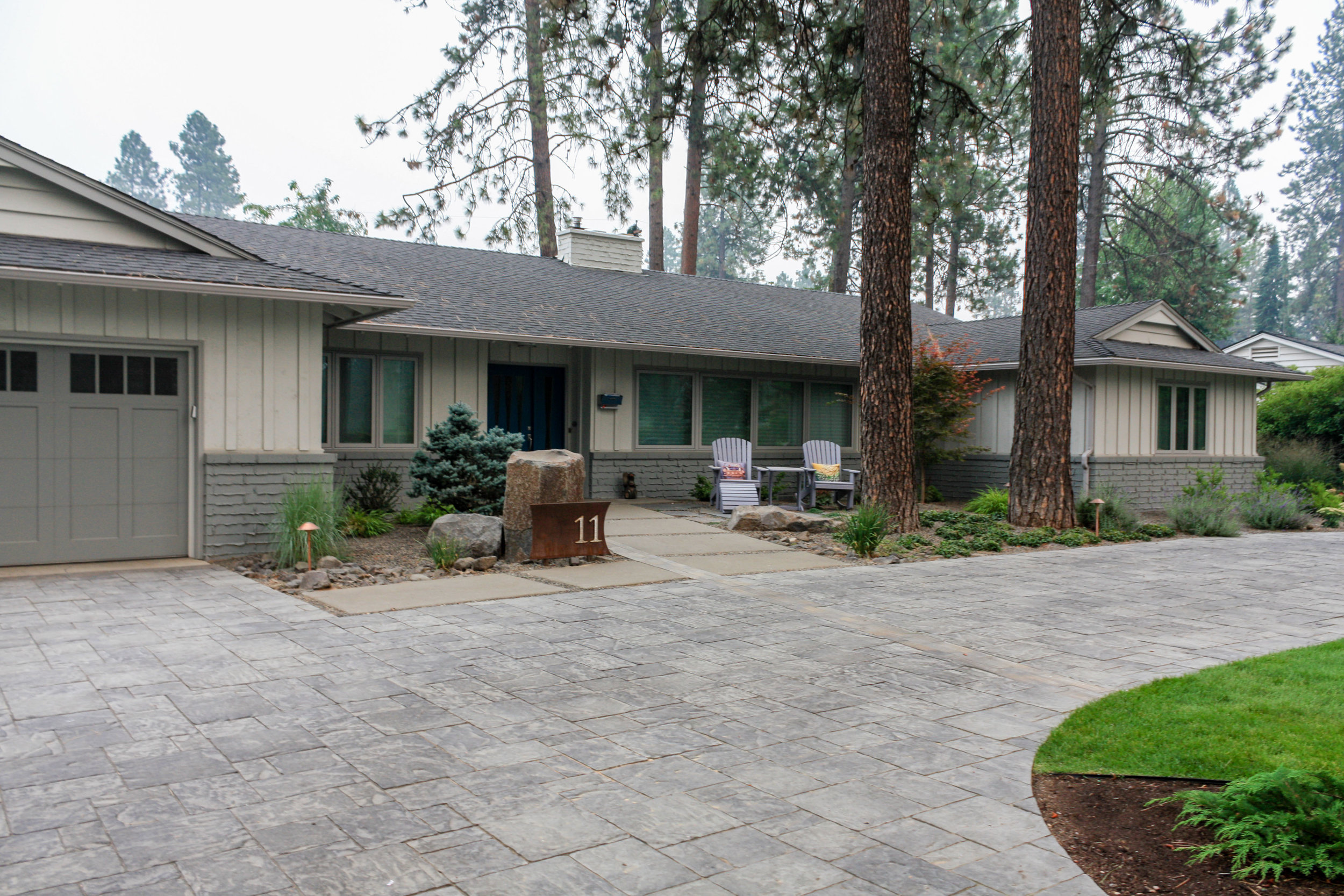 mid century ranch with paver driveway