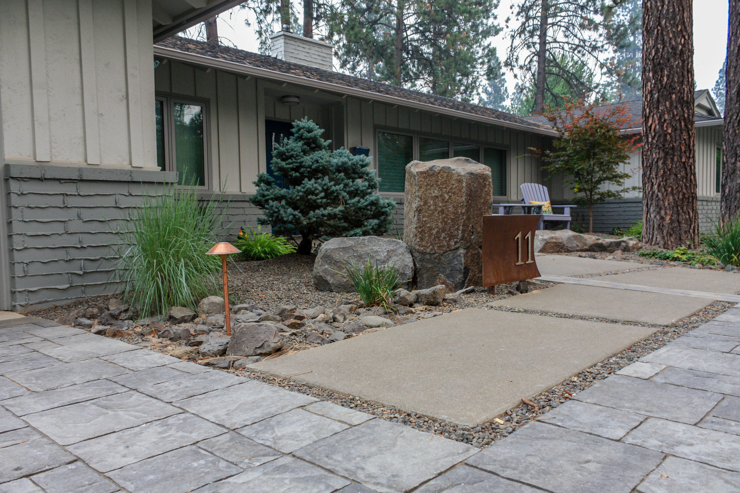 sandwashed concrete pad walkway with pavers