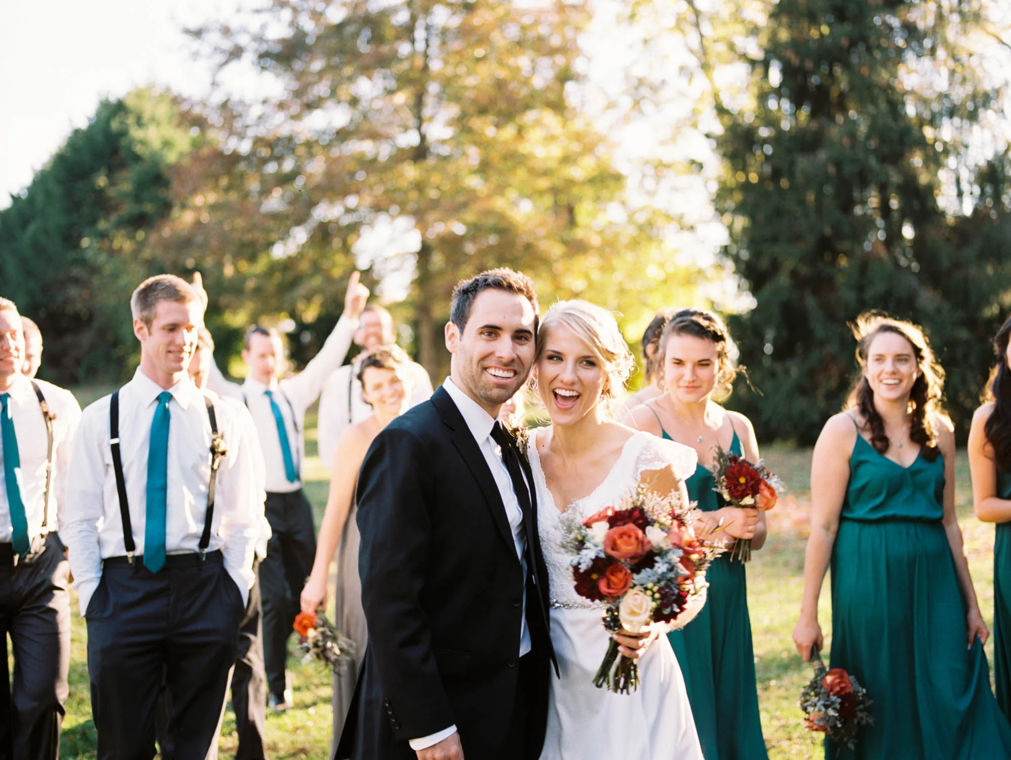“One of my favorite pictures was of me and Bryan and our groomsmen and bridesmaids. We are all close together and everyone is laughing and having a good time and the picture really captured that moment and still makes me smile to this day!” — Deborah, bride