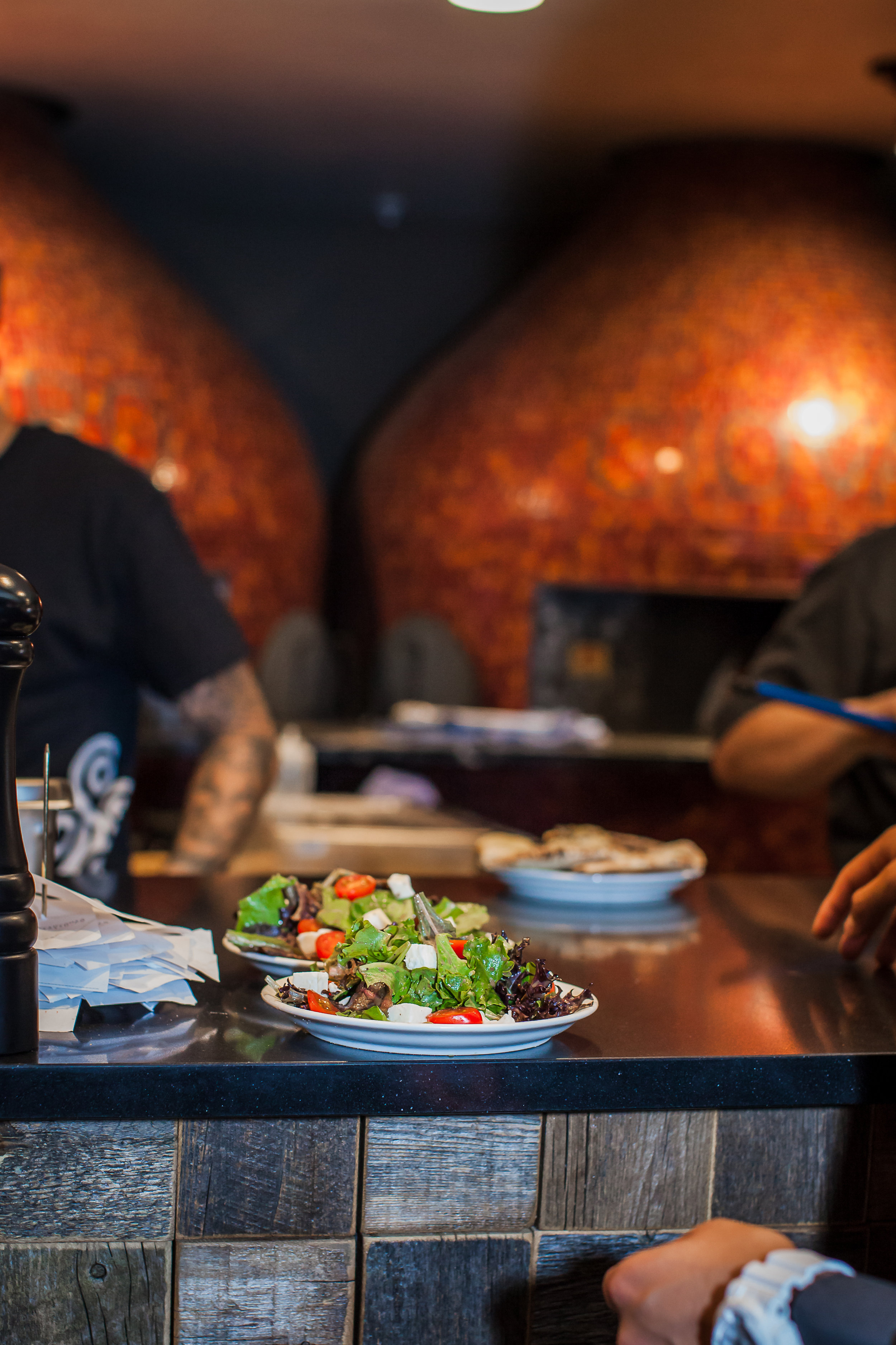  Our Ovens “Arturo” and “Giovanni” are hand-built in Italy with a volcanic rock base. 