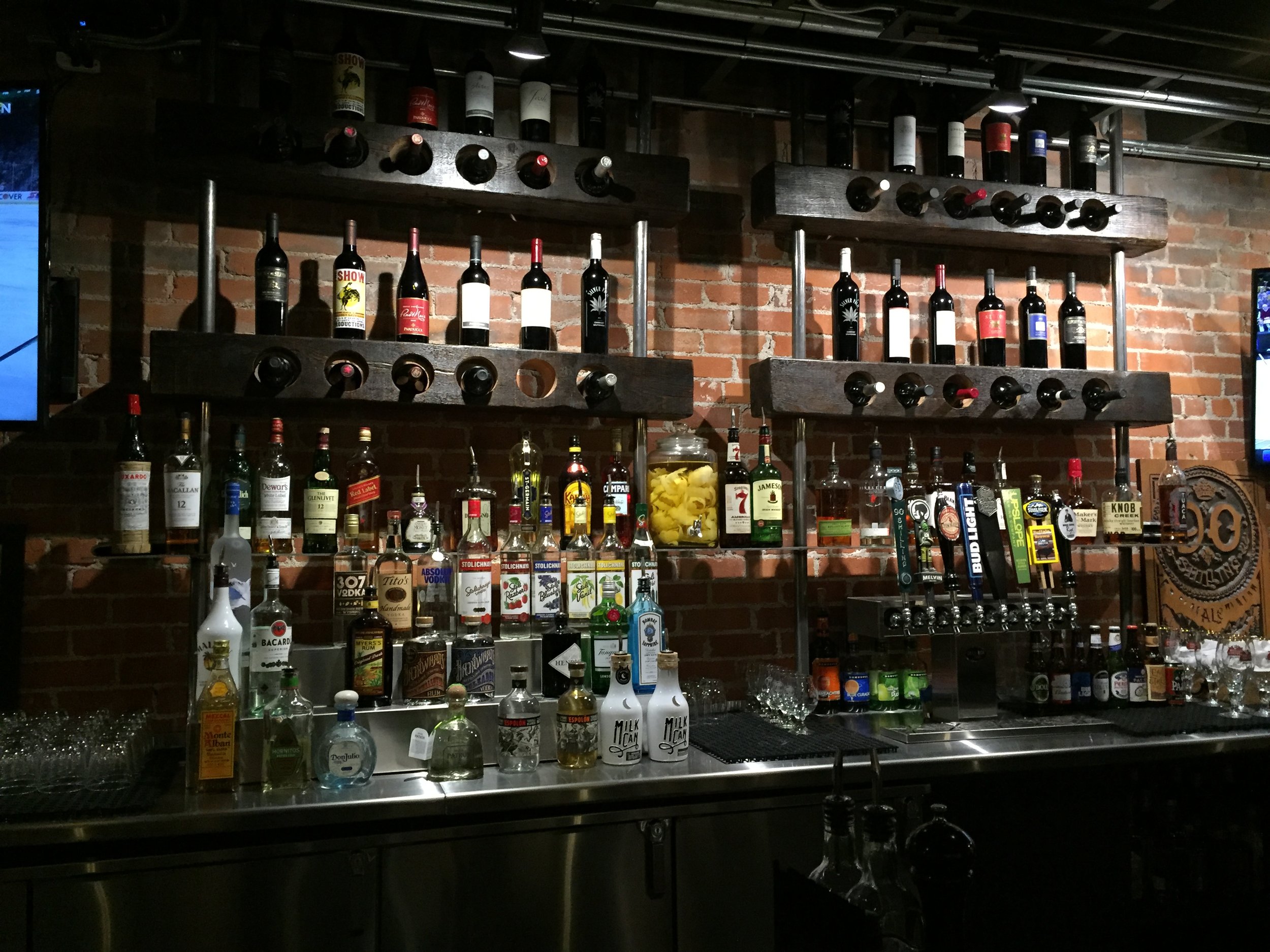  Full bar, featuring local brewery’s and distillers.  