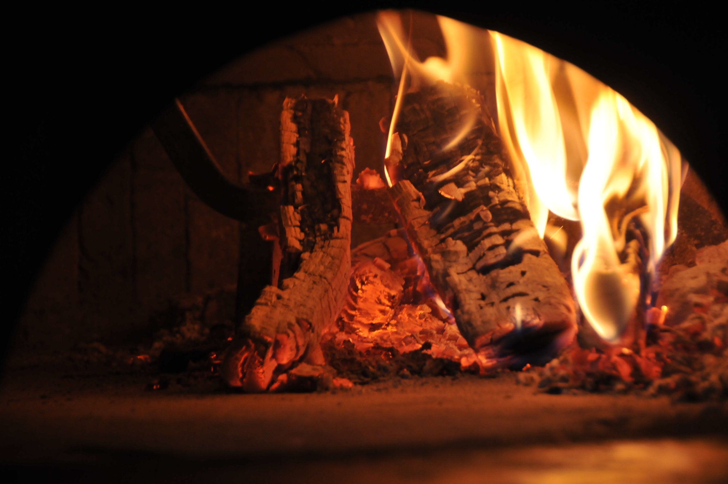  Pizzas are cooked in 60 seconds in Wood-Fired oven according to strict Italian tradition. 