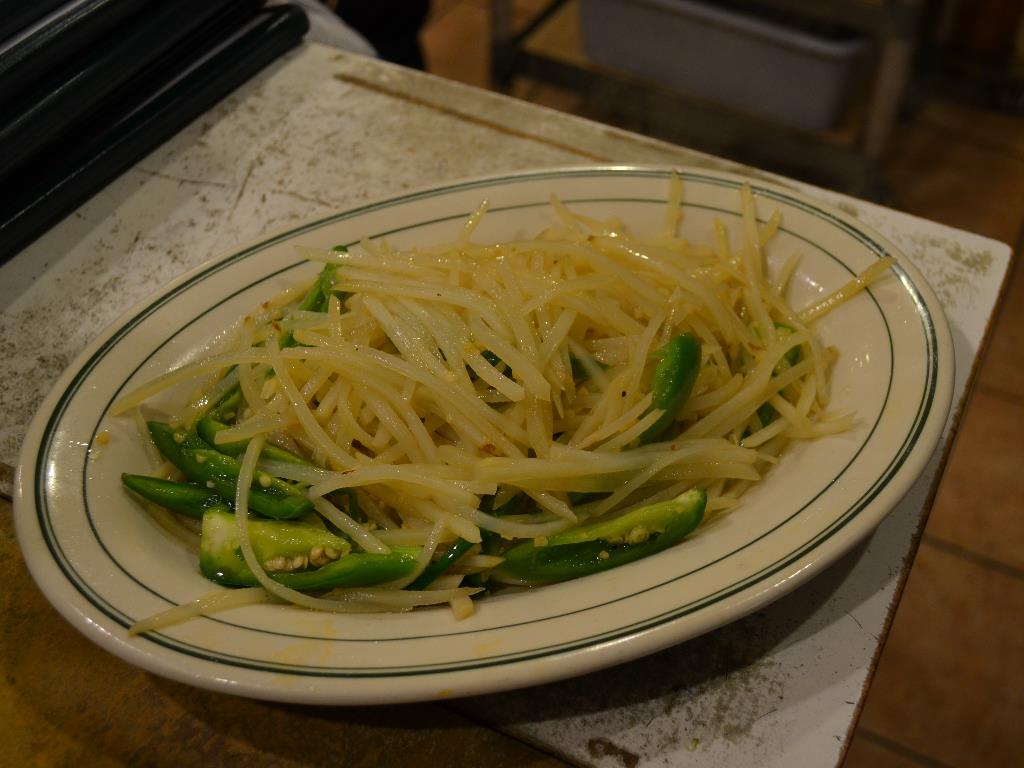 Jalapeno Potato - thinly sliced potato stir-fried with jalapenos