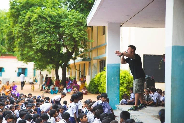 Jason preaching India school.jpg