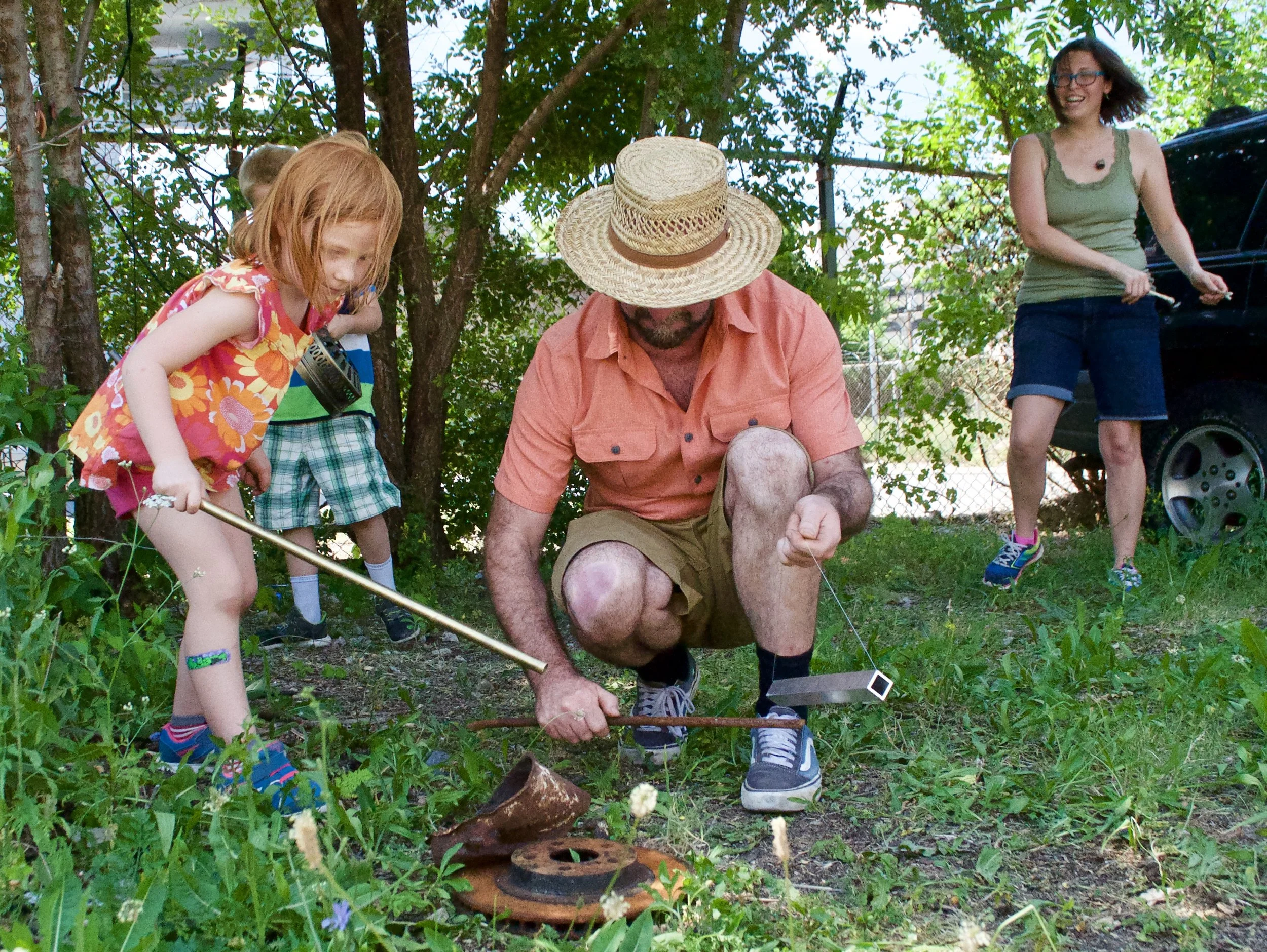 Participants at the June 11th workshop experiment with sounds in Camp Washington