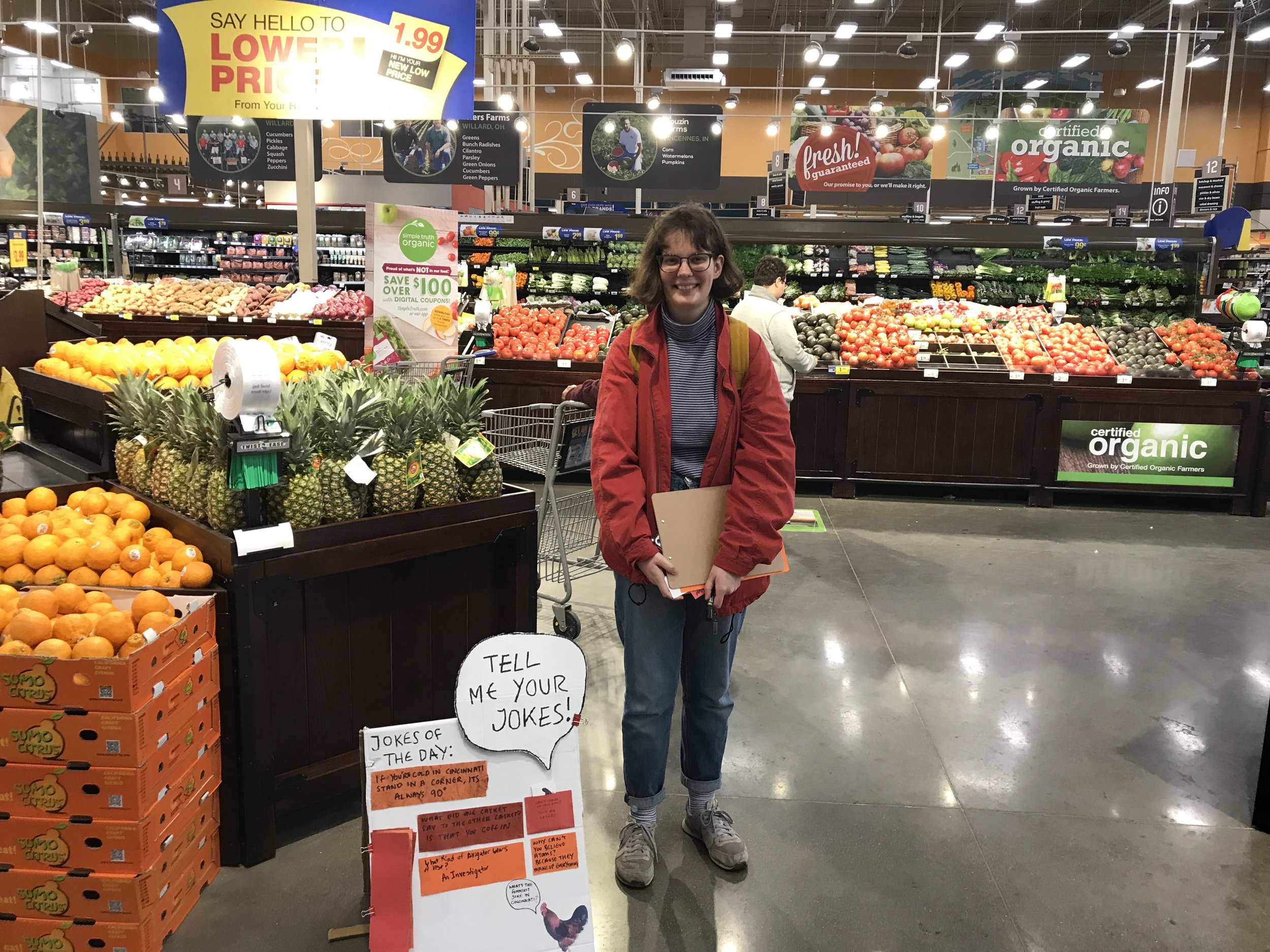 Sophie collecting jokes at Kroger