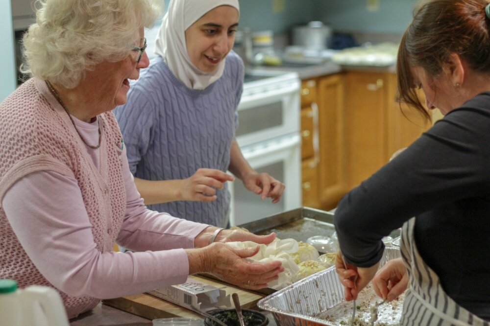  Alaa, Jane and Amy prepare the November Cincinnati’s Table meal, photo courtesy of Biz Young. 