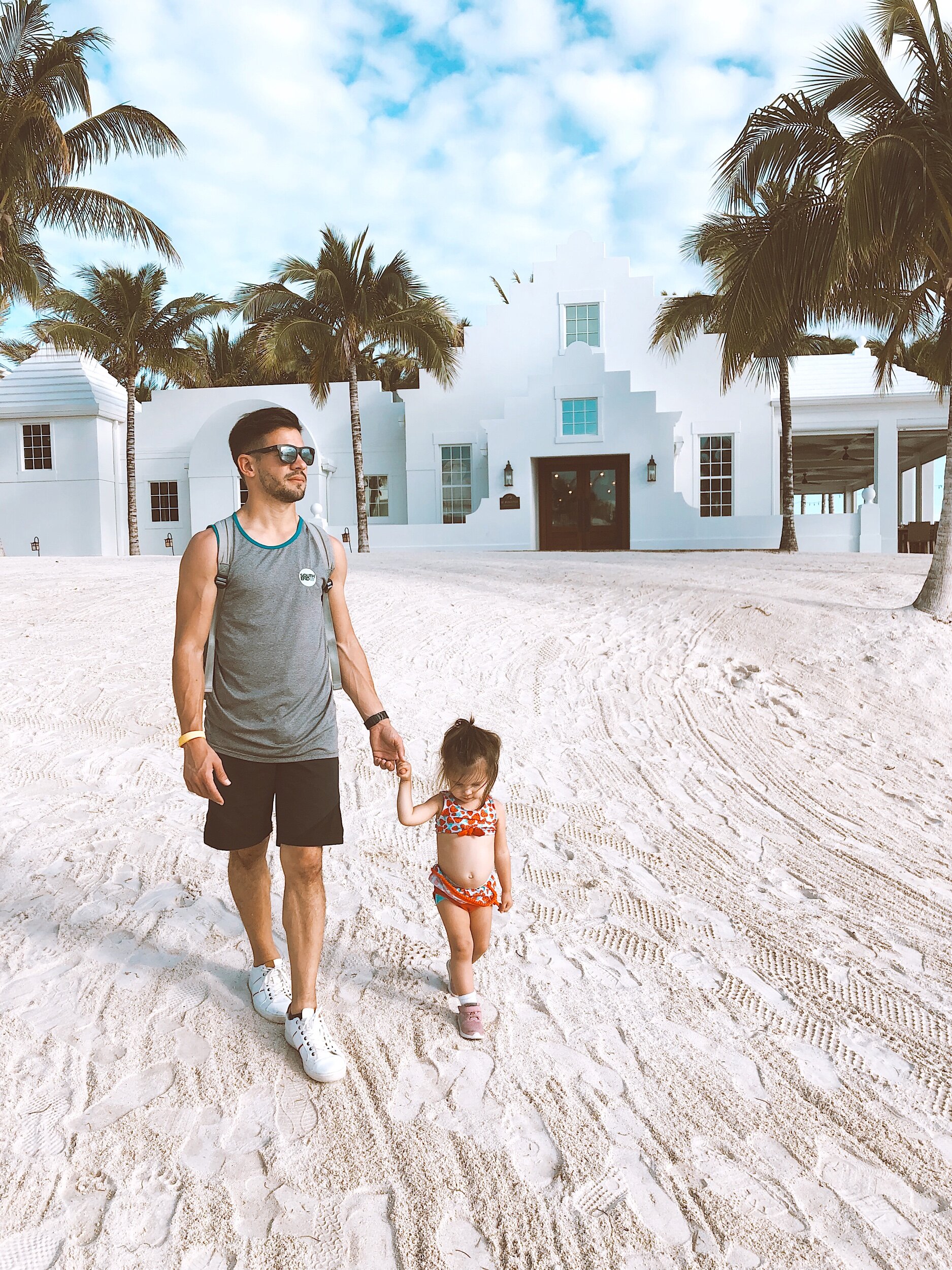Father-daughter-walking-Florida-Keys-Isla-Bella-Beach-Resort-Mama-Travel-Blogger