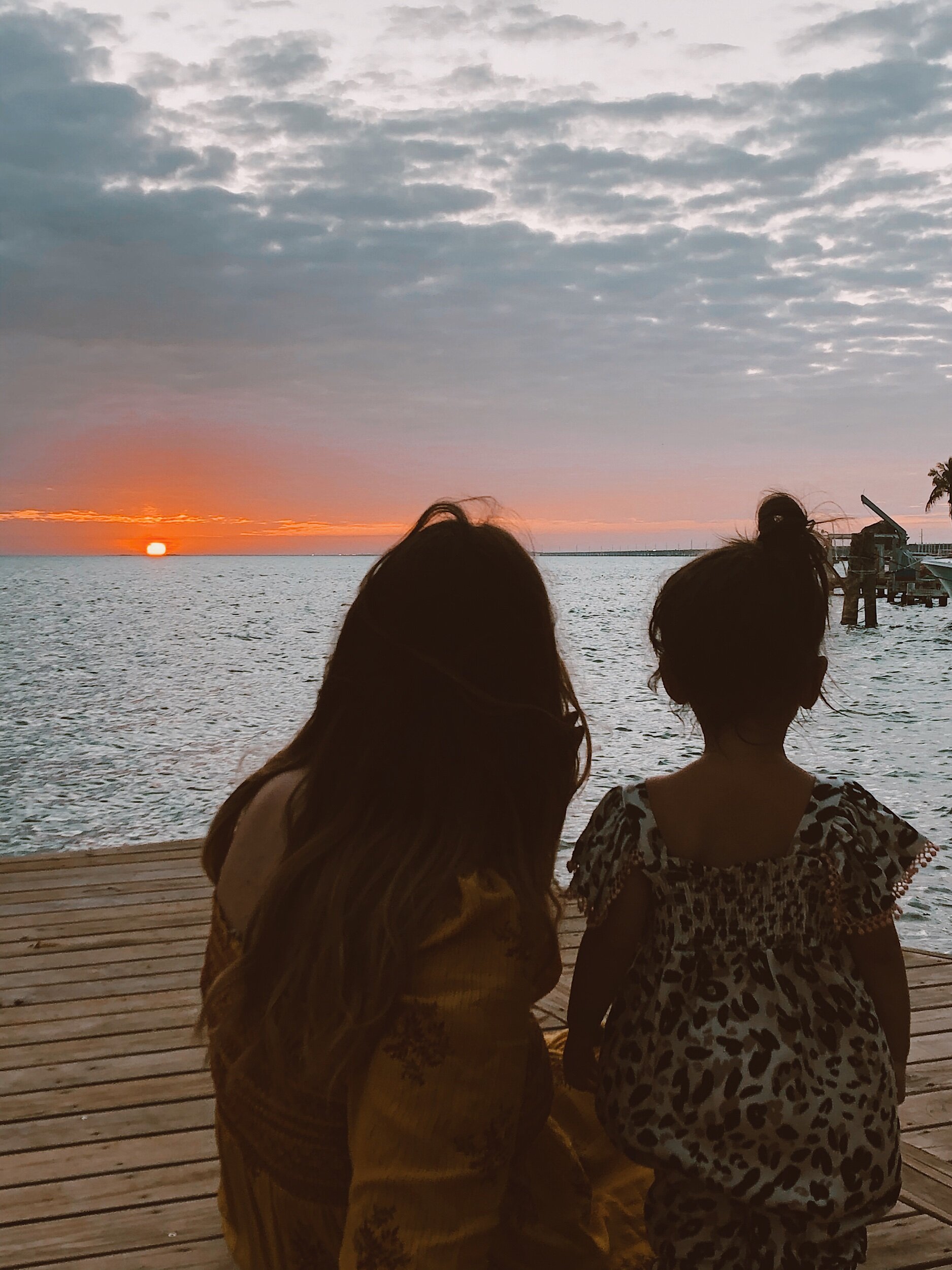 sunset-beach-mother-and-daughter-florida-keys-isla-bella-beach-resort