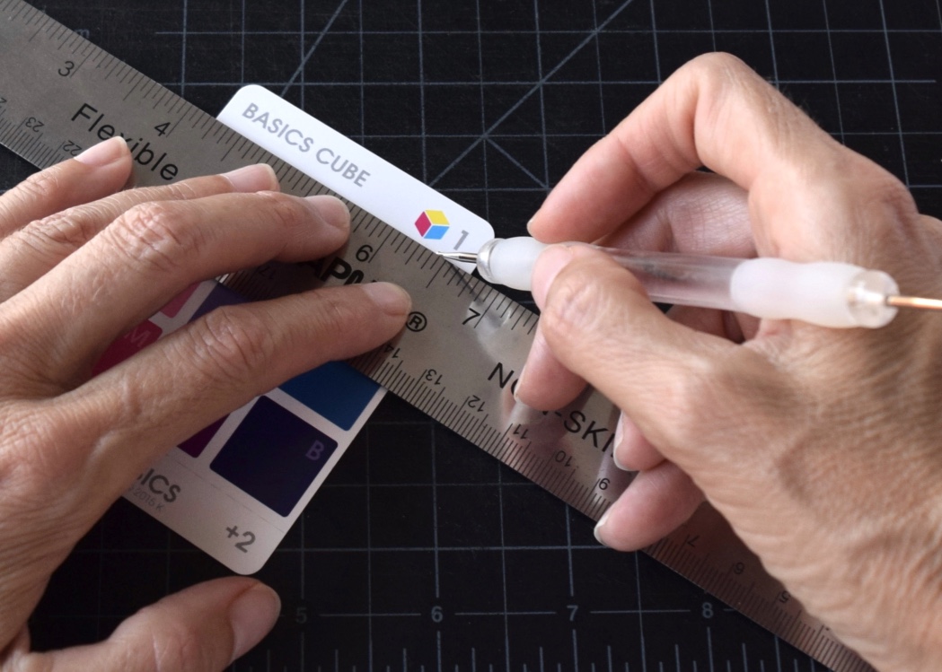 scoring the fold line