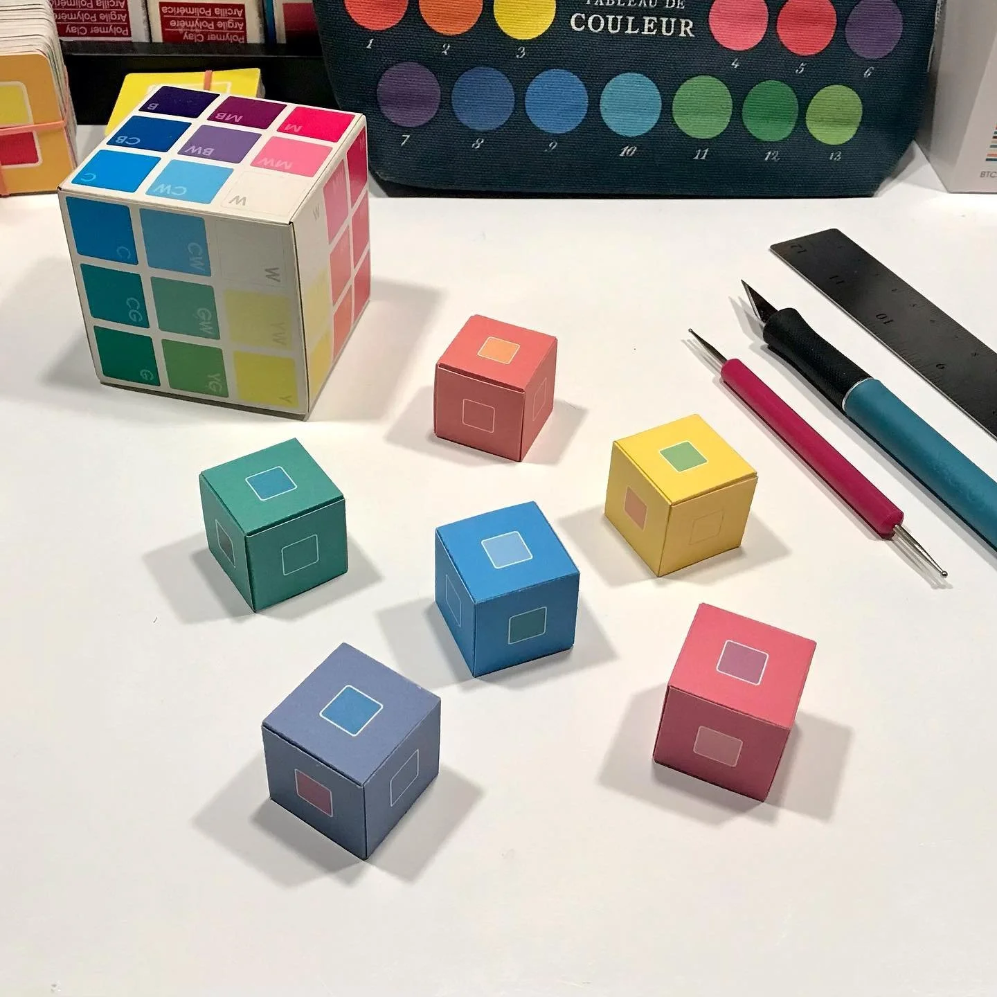 ADVENT PREVIEW : CUBES WITH CODES

Here&rsquo;s a peek at some of the prototypes I&rsquo;ve been making for my upcoming interactive Colour Cube Advent-ure challenge that starts December 1.

Made entirely of paper (and without glue or tape), these soo