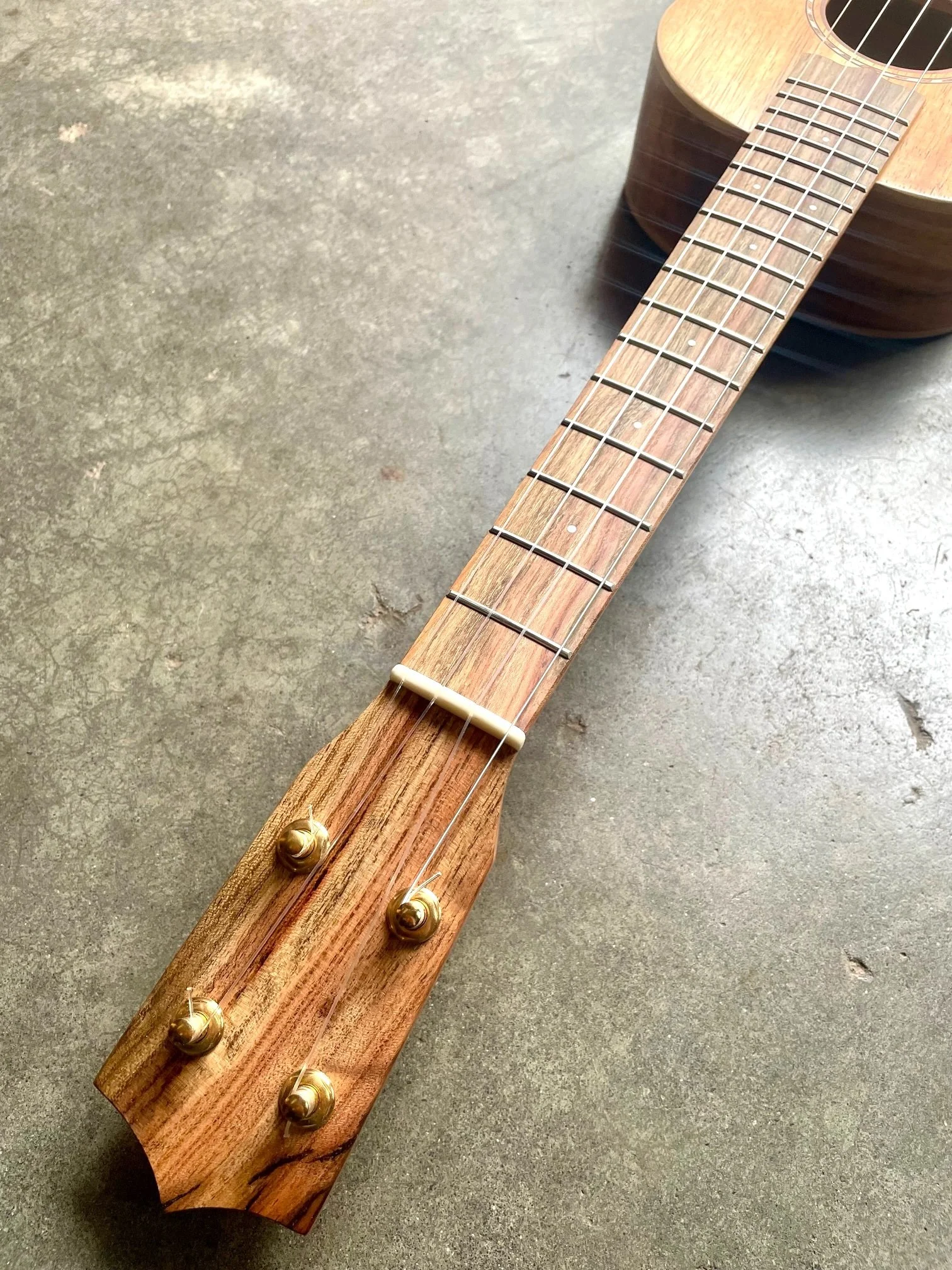 koa headstock.jpeg