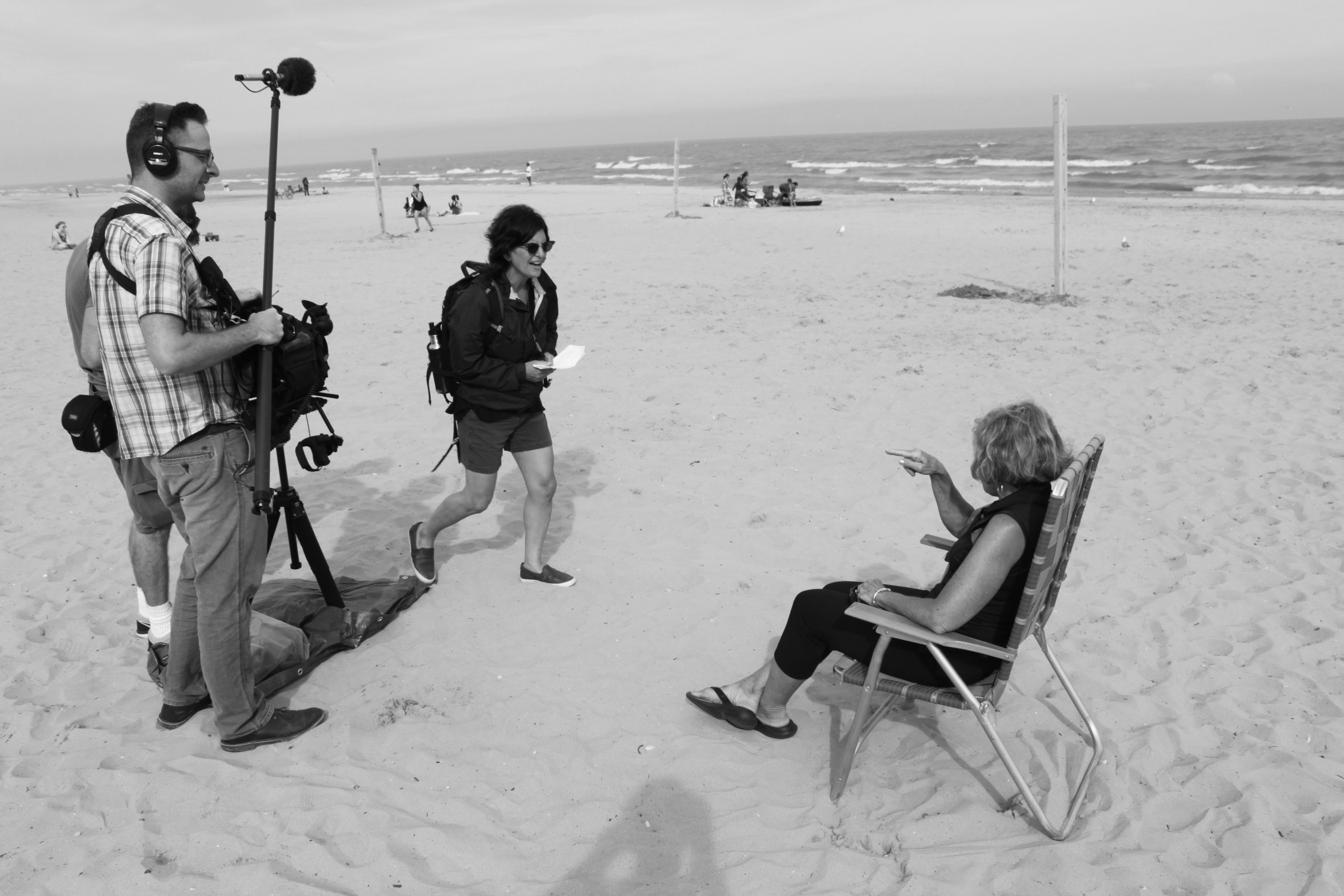 Director Deb Tolchinsky filming the documentary True Memories and Other Falsehoods with Penny Beerntsen at Neshotah beach in Two Rivers, Wisconsin
