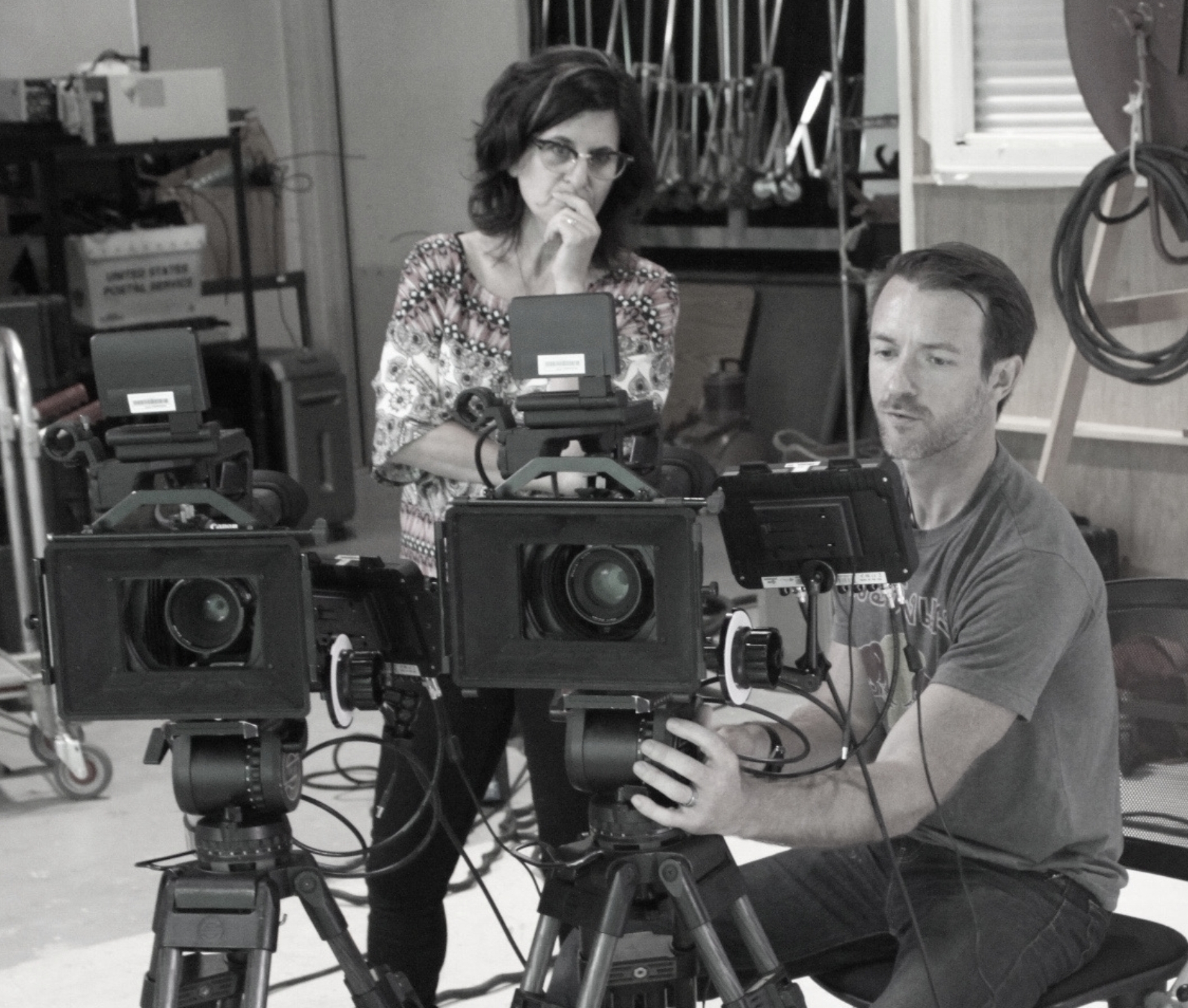 Cinematographer Joel McGinty and documentary director Debra Tolchinsky prepare to interview Penny Beerntsen for the documentary True Memories and Other Falsehoods 