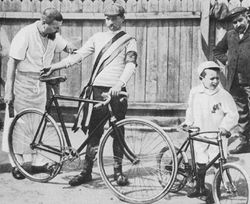 Maurice Garin; Inaugural winner of le Tour. And some random kid.