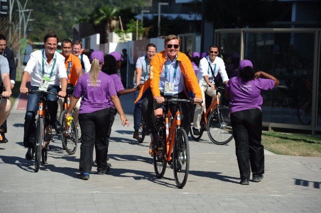 The King of the Netherlands and the Dutch Prime Minster; biking amongst the crowds in Rio