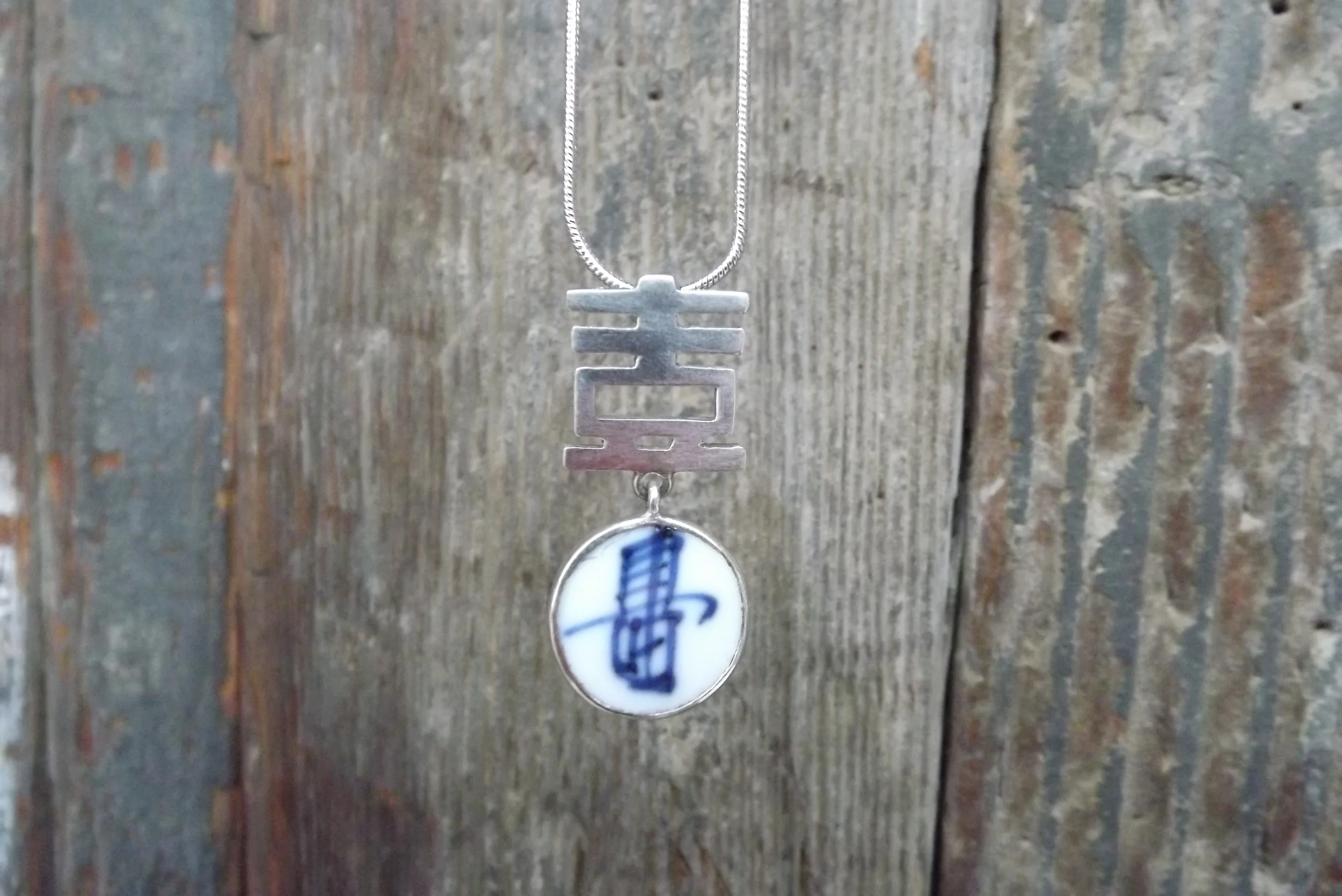 Blue and white longevity character pendant