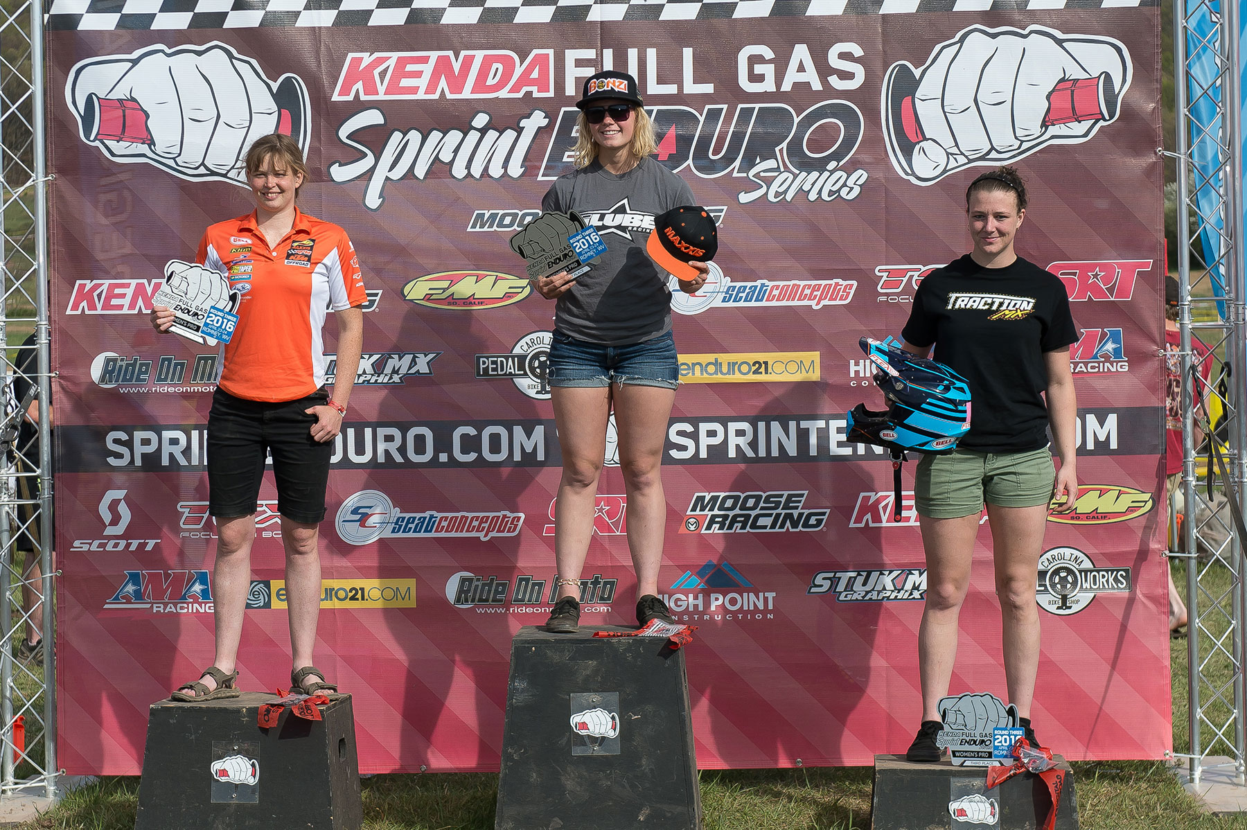 Women's podium L to R: Rachel Gutish (2nd), Brooke Cosner (1st), and Shawn Davidson (3rd). Photo by Shan Moore.