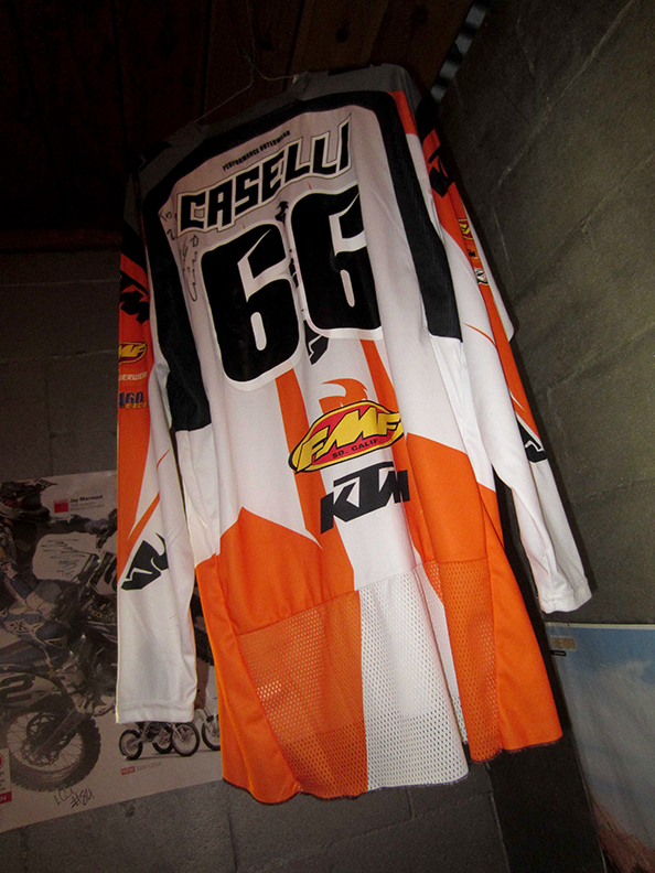 The Caselli jersey that still hangs in the same spot Zeke put it.
Normal
0
false
false
false
EN-US
X-NONE
X-NONE
/* Style Definitions */
table.MsoNormalTable
{mso-style-name:"Table Normal";
mso-tstyle-rowband-size:0;
mso-tstyle-colband-size:0;
mso-style-noshow:yes;
mso-style-priority:99;
mso-style-parent:"";
mso-padding-alt:0in 5.4pt 0in 5.4pt;
mso-para-margin:0in;
mso-para-margin-bottom:.0001pt;
mso-pagination:widow-orphan;
font-size:11.0pt;
font-family:"Calibri",sans-serif;
mso-ascii-font-family:Calibri;
mso-ascii-theme-font:minor-latin;
mso-hansi-font-family:Calibri;
mso-hansi-theme-font:minor-latin;
mso-bidi-font-family:"Times New Roman";
mso-bidi-theme-font:minor-bidi;}