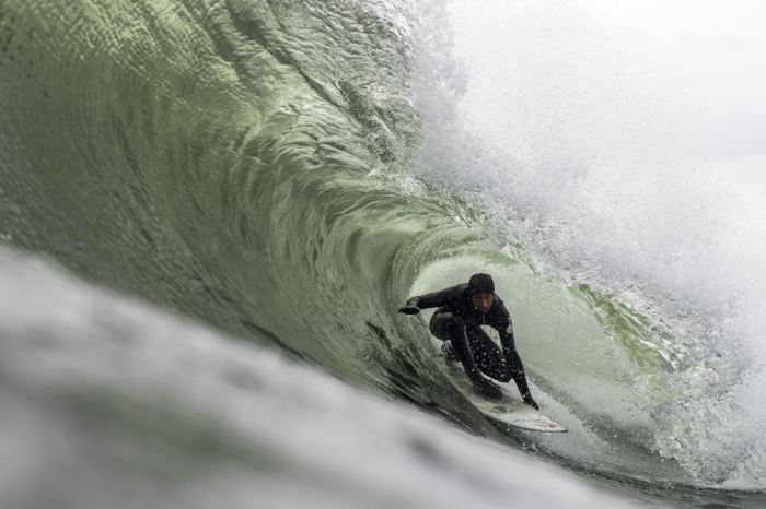 March 24th - I was keeping my eye on the line-up, waiting for the next set to come. When out of the corner of my eye I saw Isaac Raddysh pulling into a hollow little insider. This was a really fun session to shoot, it ended up being one of the last decent days at this spot for the winter. This image was featured in an online gallery for SURFER Magazine.