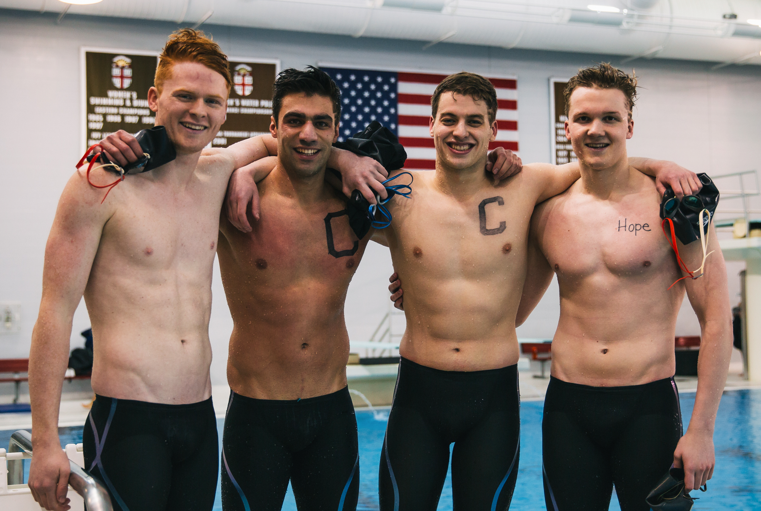 Kick for Kids founder, Cyrus Morrison, with his Cornell teammates.